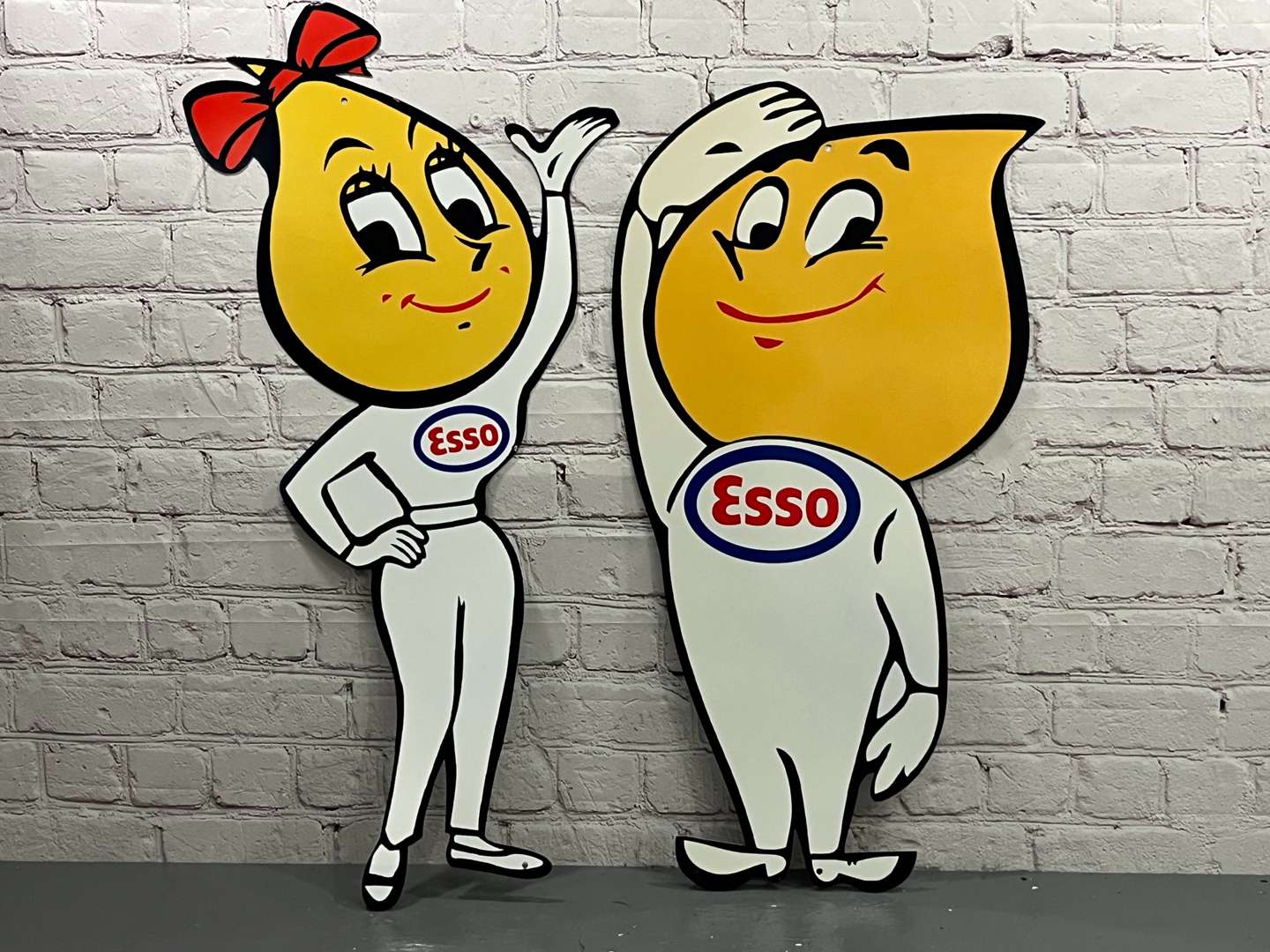 <p>Esso Mr and Mrs Drip Metal Signs&nbsp;</p>