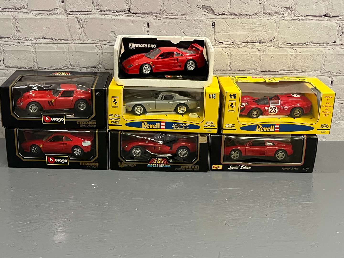 <p>Seven Ferrari 1:18 Scale Models&nbsp;</p>