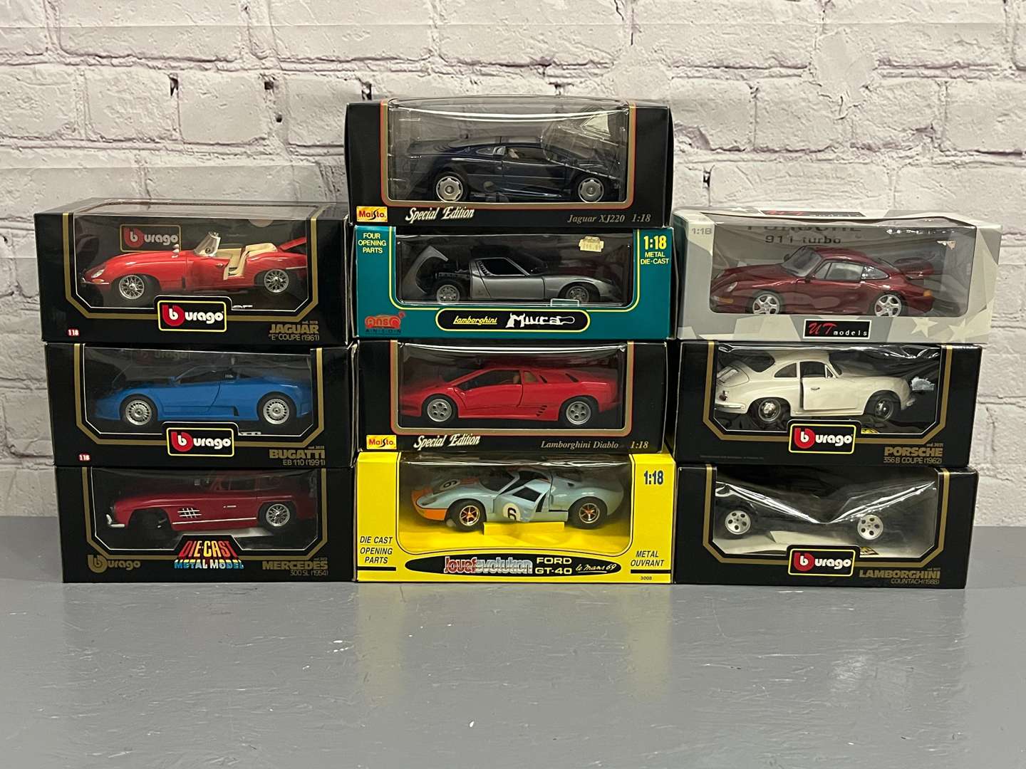 <p>Ten 1:18 Scale Model, Jaguars, Porsche, Bugatti Etc</p>