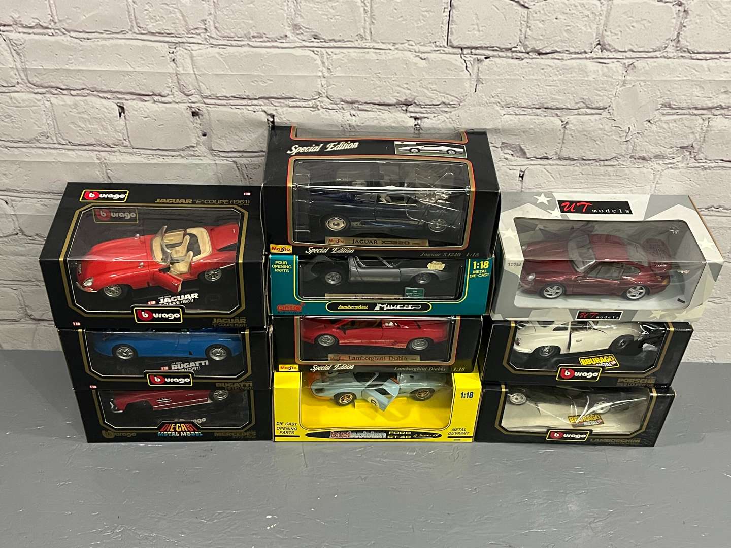 <p>Ten 1:18 Scale Model, Jaguars, Porsche, Bugatti Etc</p>