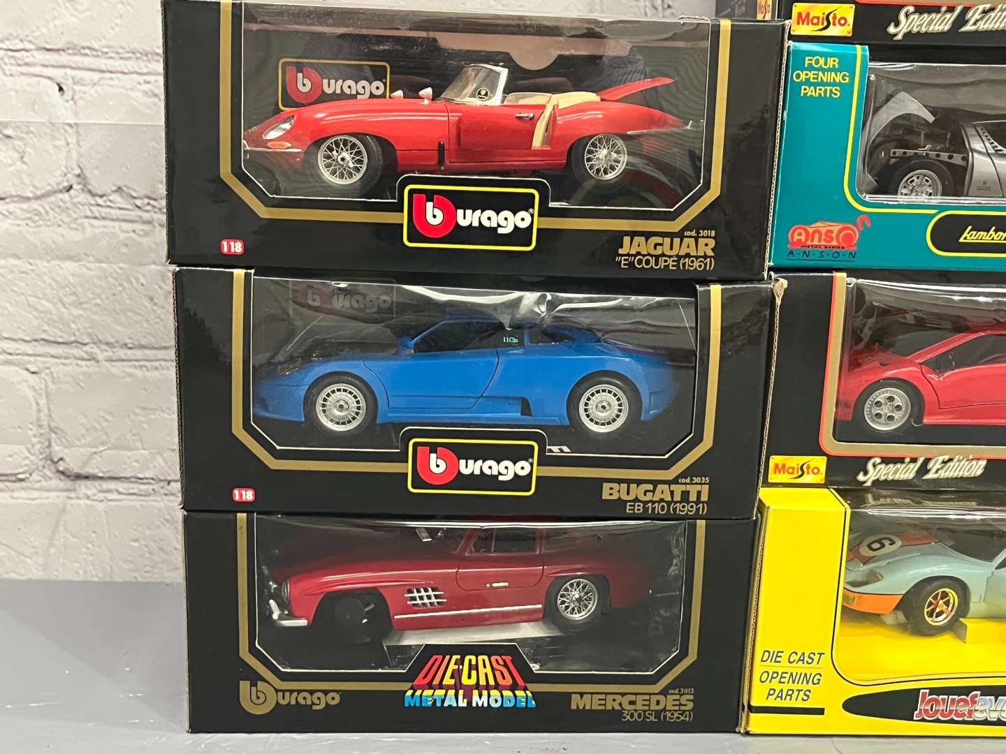 <p>Ten 1:18 Scale Model, Jaguars, Porsche, Bugatti Etc</p>