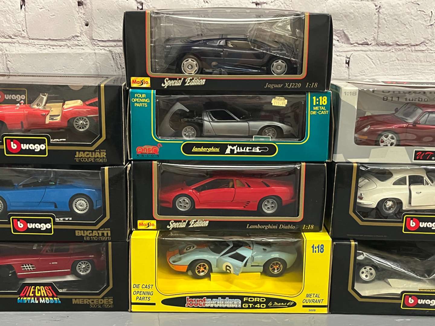 <p>Ten 1:18 Scale Model, Jaguars, Porsche, Bugatti Etc</p>