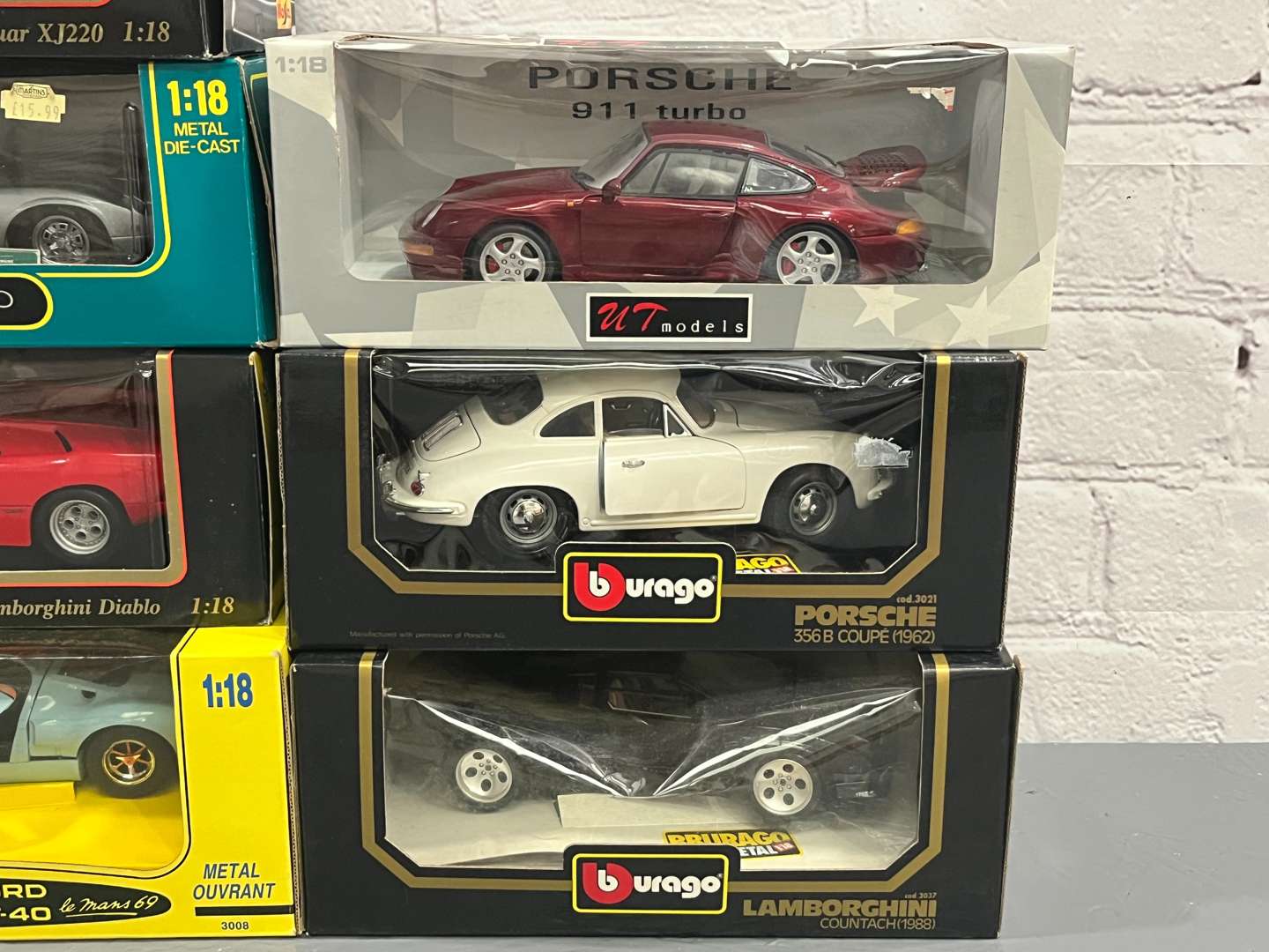 <p>Ten 1:18 Scale Model, Jaguars, Porsche, Bugatti Etc</p>