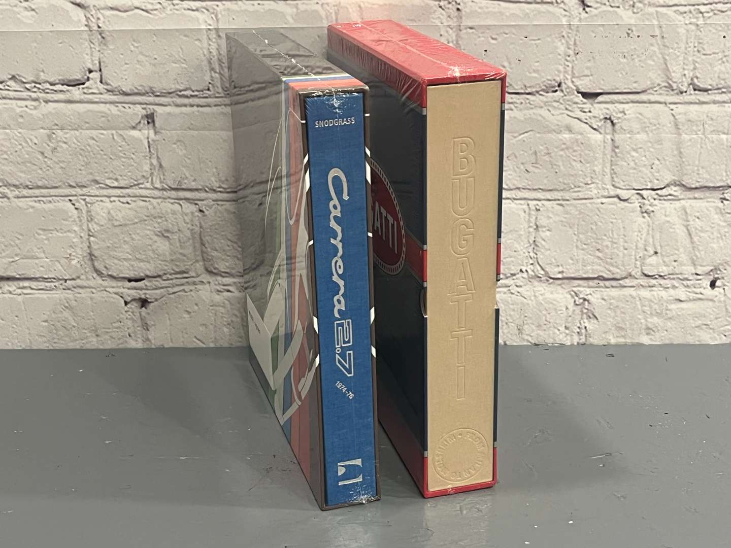 <p>Bugatti and Porsche Carrera 2.7 Limited Edition Books&nbsp;</p>