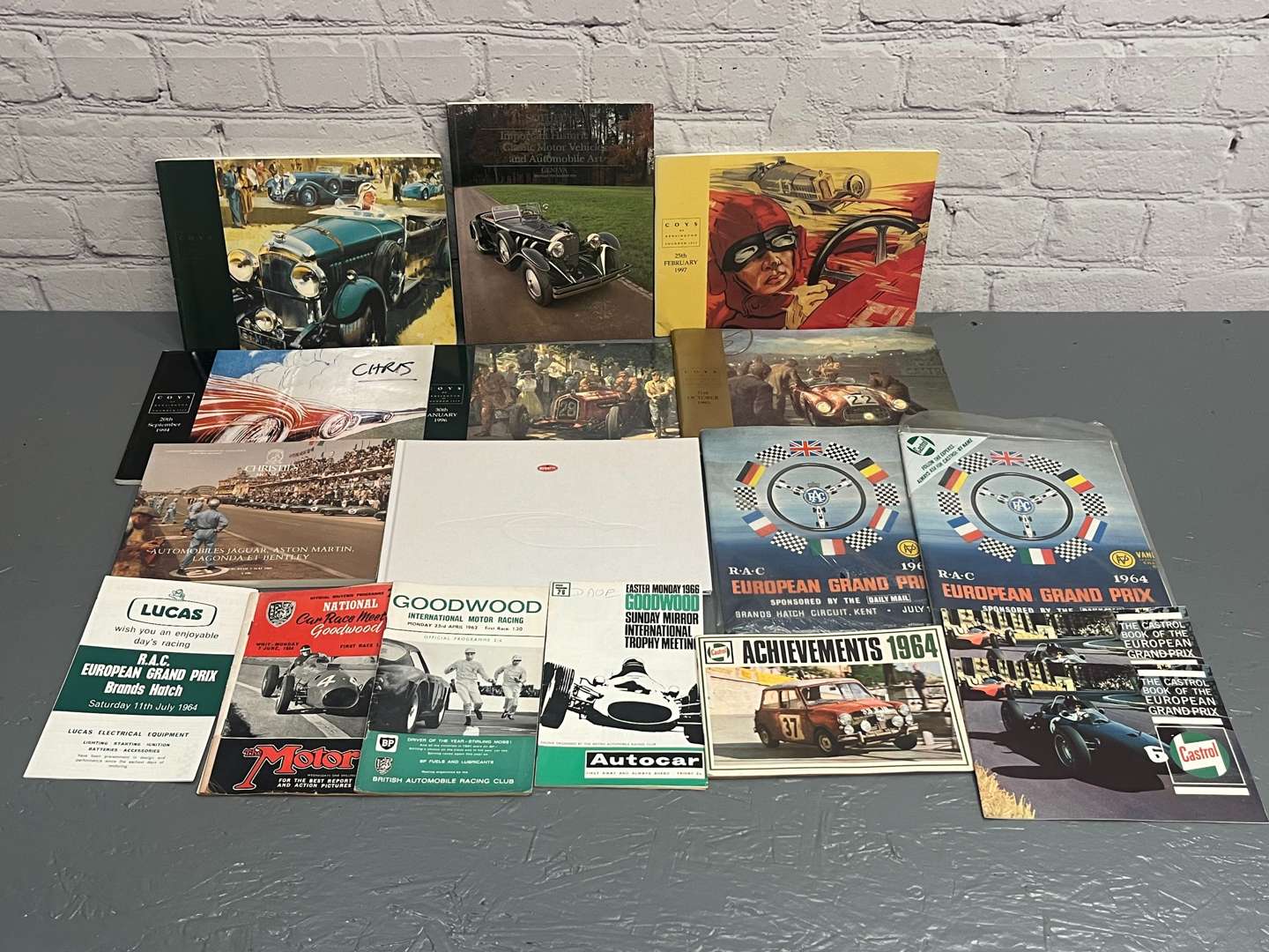 <p>Old Auction Catalogues, Goodwood Programmes Etc</p>