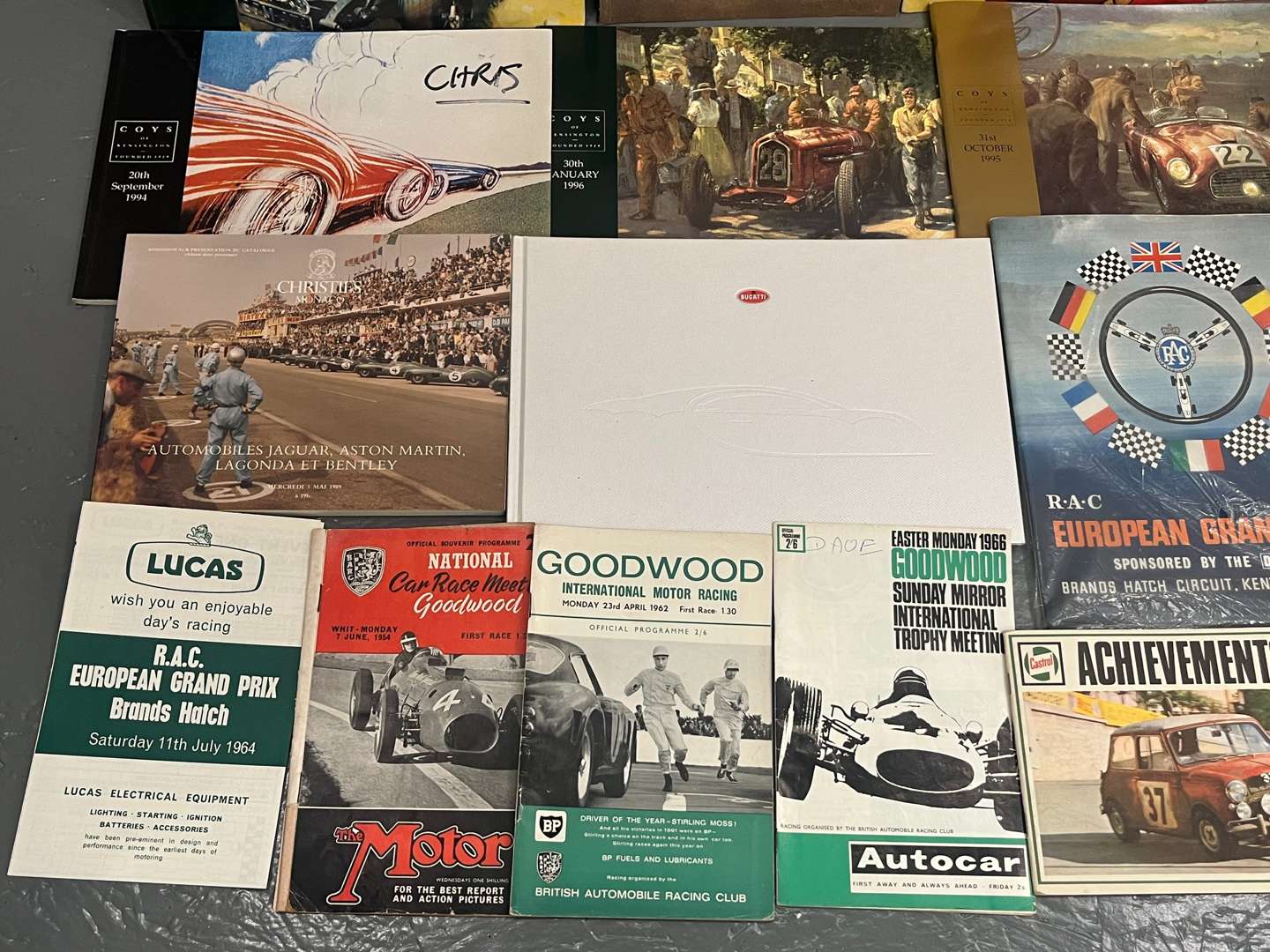 <p>Old Auction Catalogues, Goodwood Programmes Etc</p>