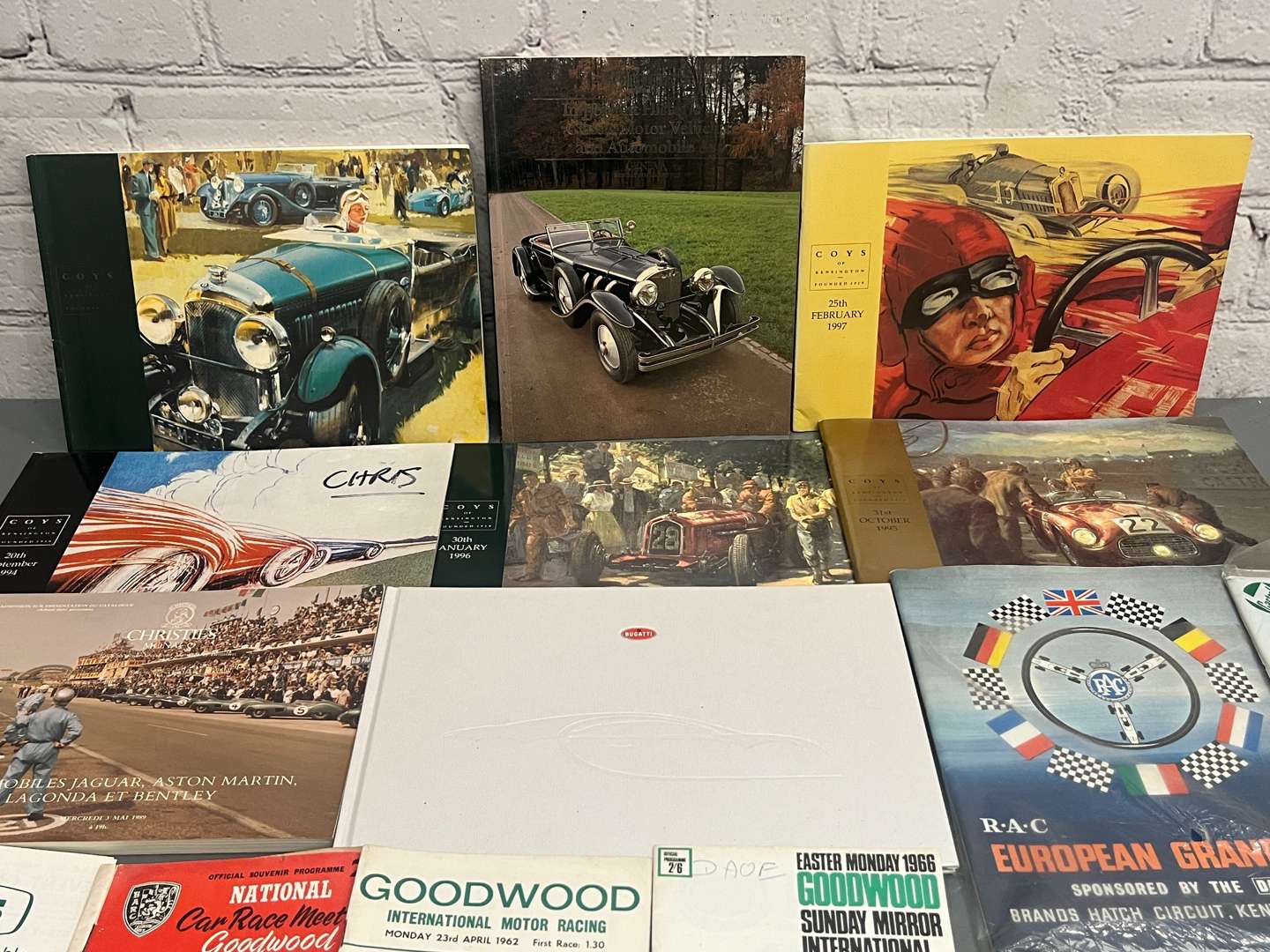 <p>Old Auction Catalogues, Goodwood Programmes Etc</p>