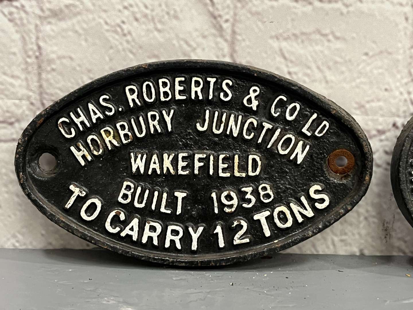 <p>Two Cast Iron Wagon Plates Dated 1938</p>