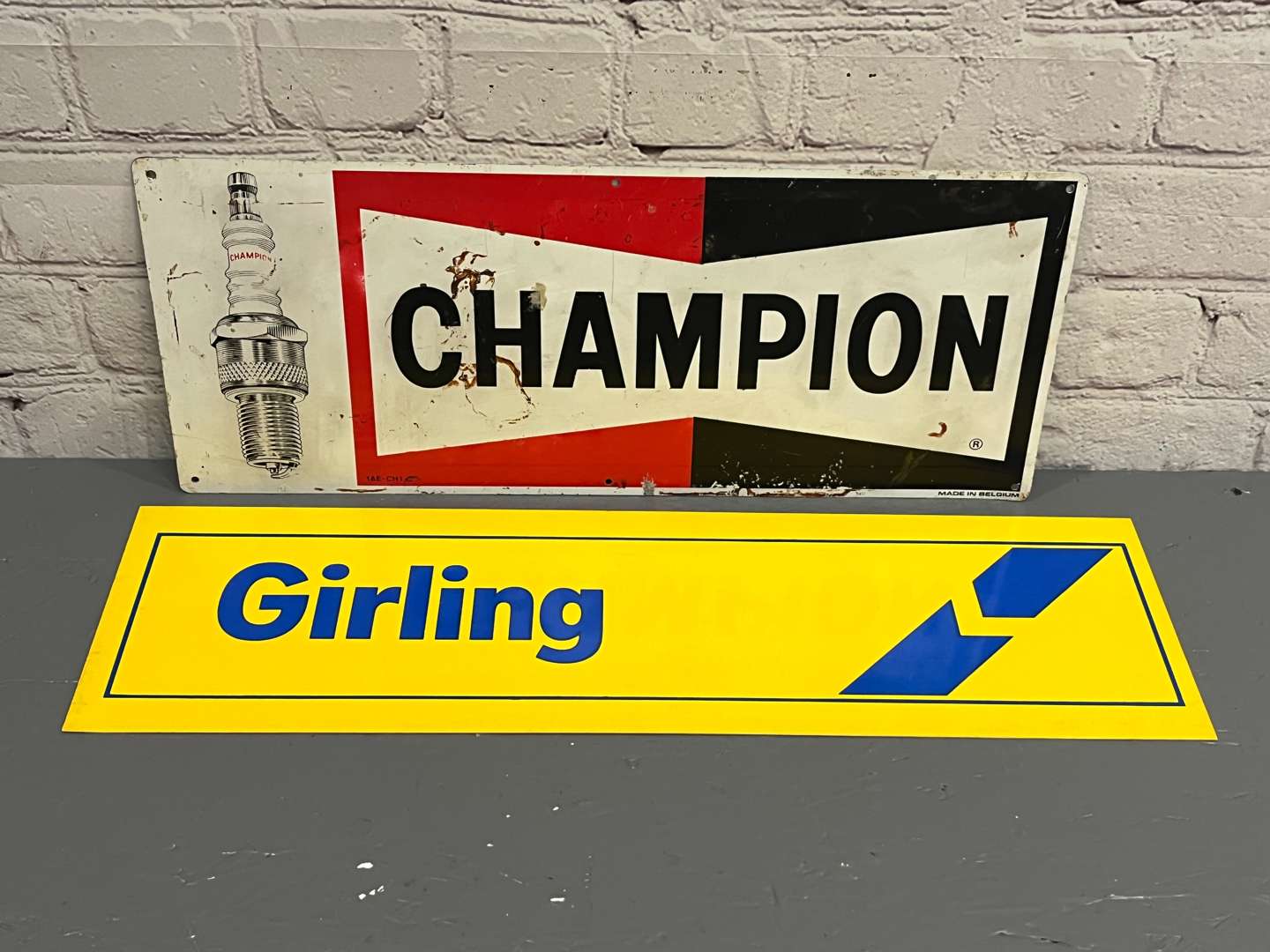 <p>Champion Spark Plug Sign and Lucas Girling Sign (2)</p>