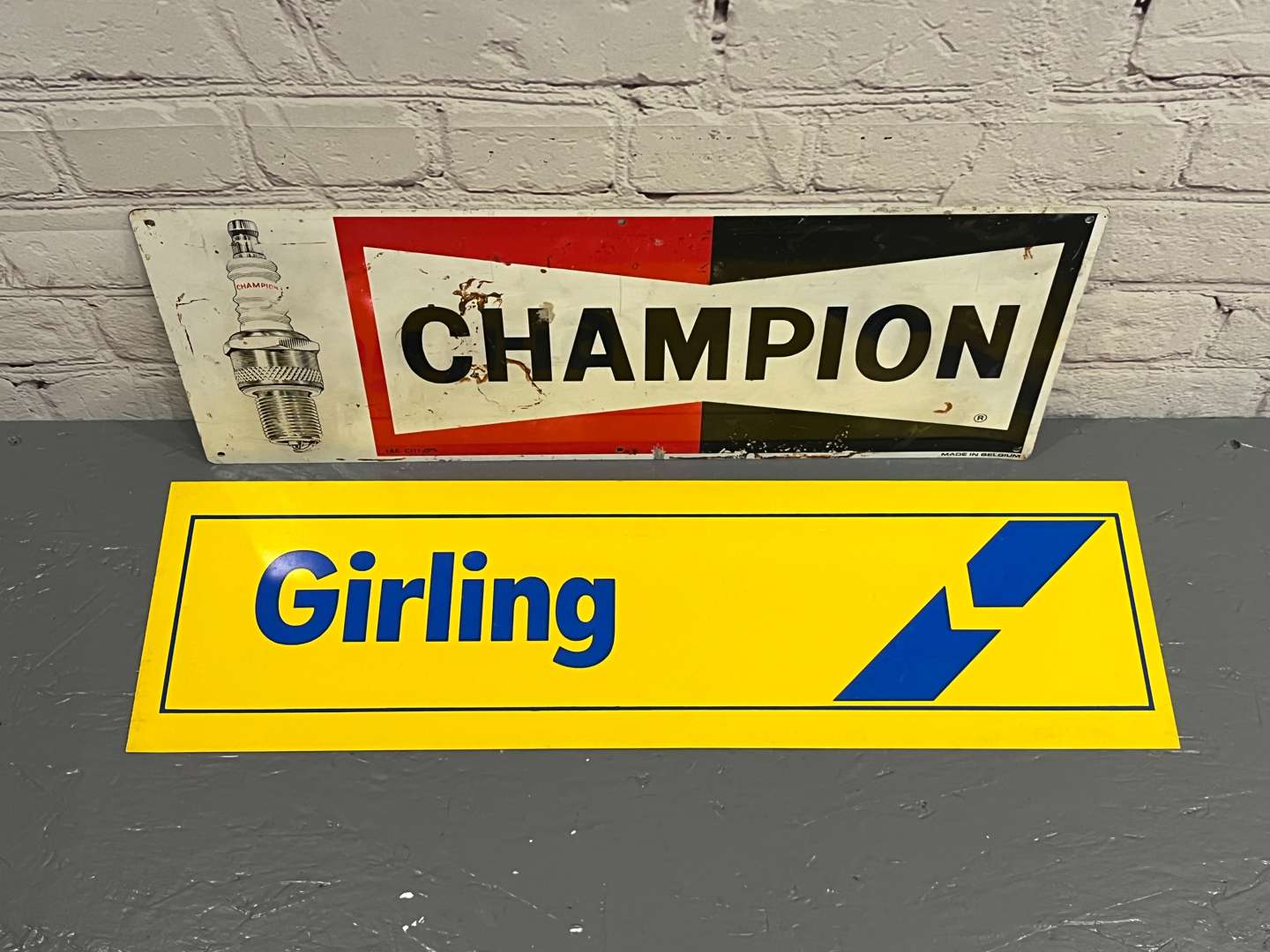 <p>Champion Spark Plug Sign and Lucas Girling Sign (2)</p>