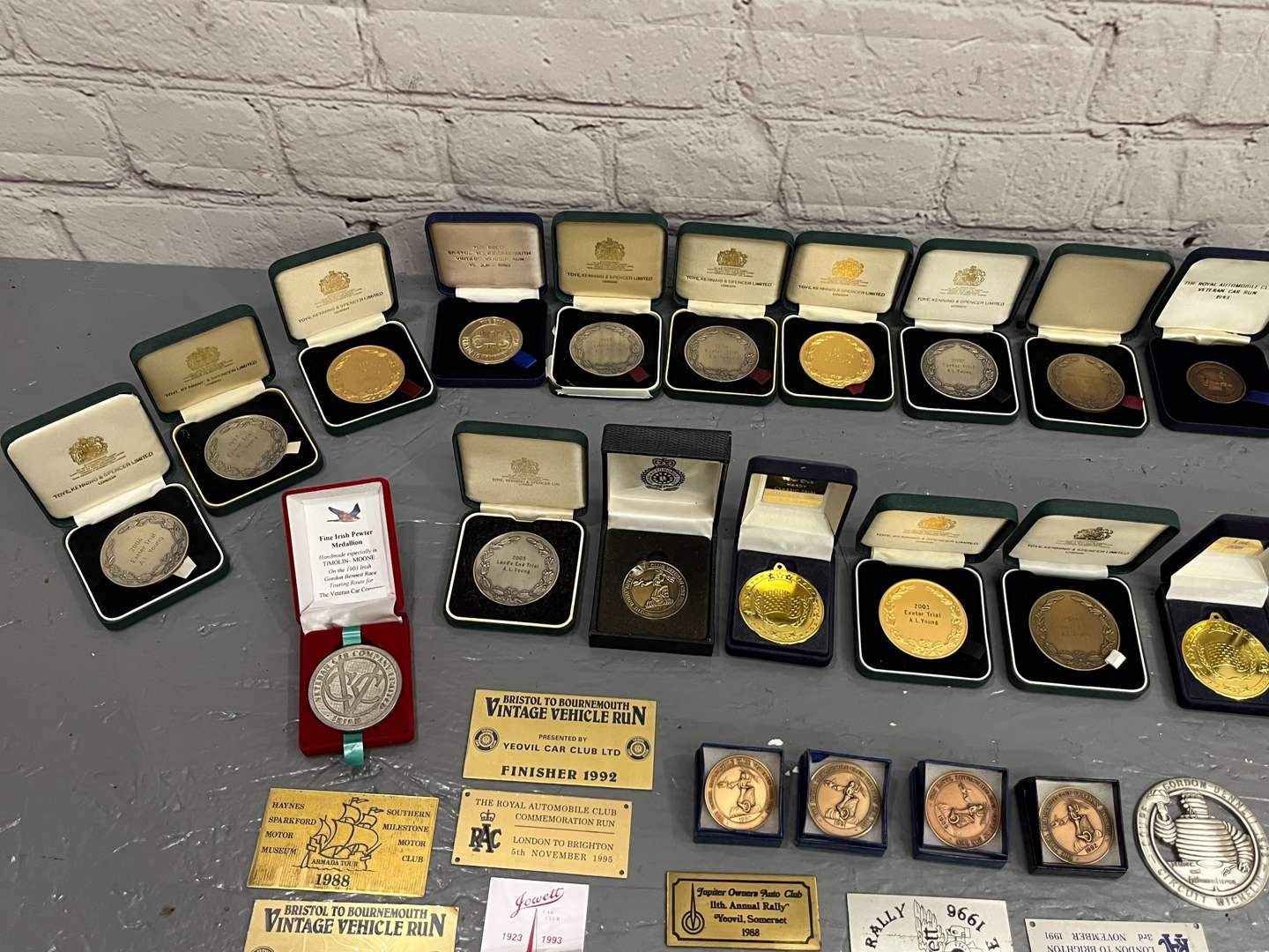 <p>Quantity Boxed Medals Racing Plaques Etc</p>