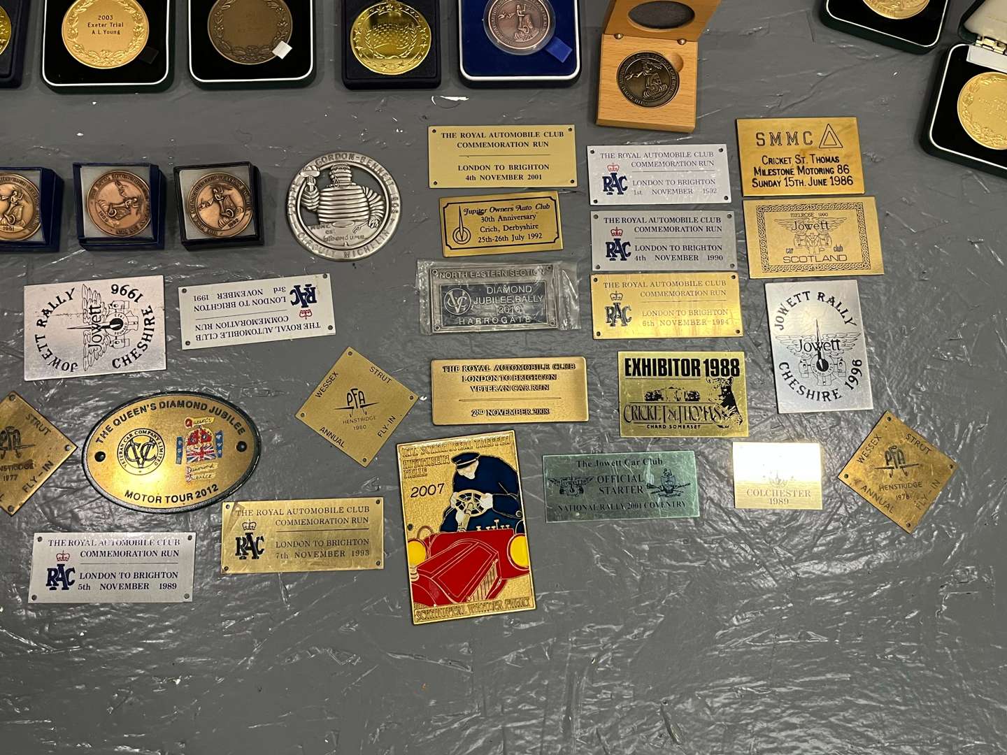 <p>Quantity Boxed Medals Racing Plaques Etc</p>