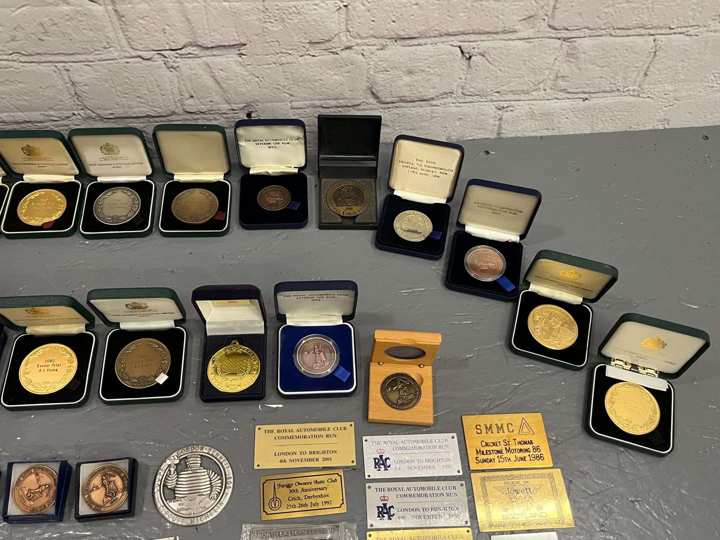 <p>Quantity Boxed Medals Racing Plaques Etc</p>