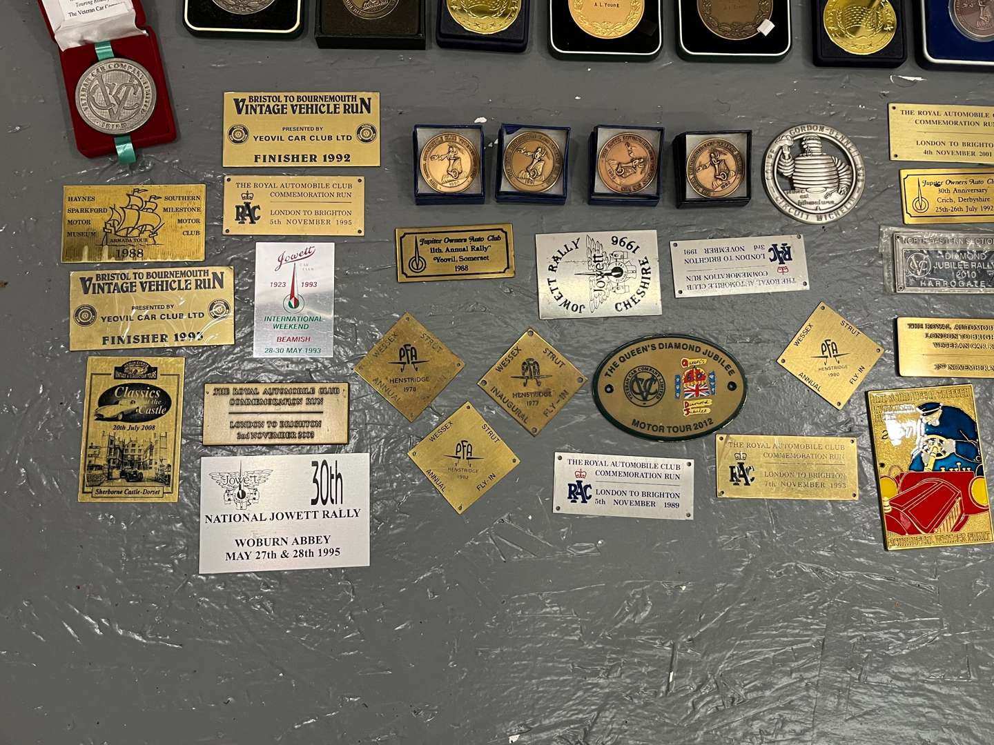 <p>Quantity Boxed Medals Racing Plaques Etc</p>