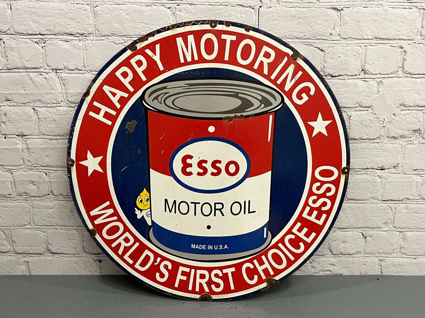 <p>Esso Motor Oil “Happy Motoring” Circular Enamel Sign&nbsp;</p>