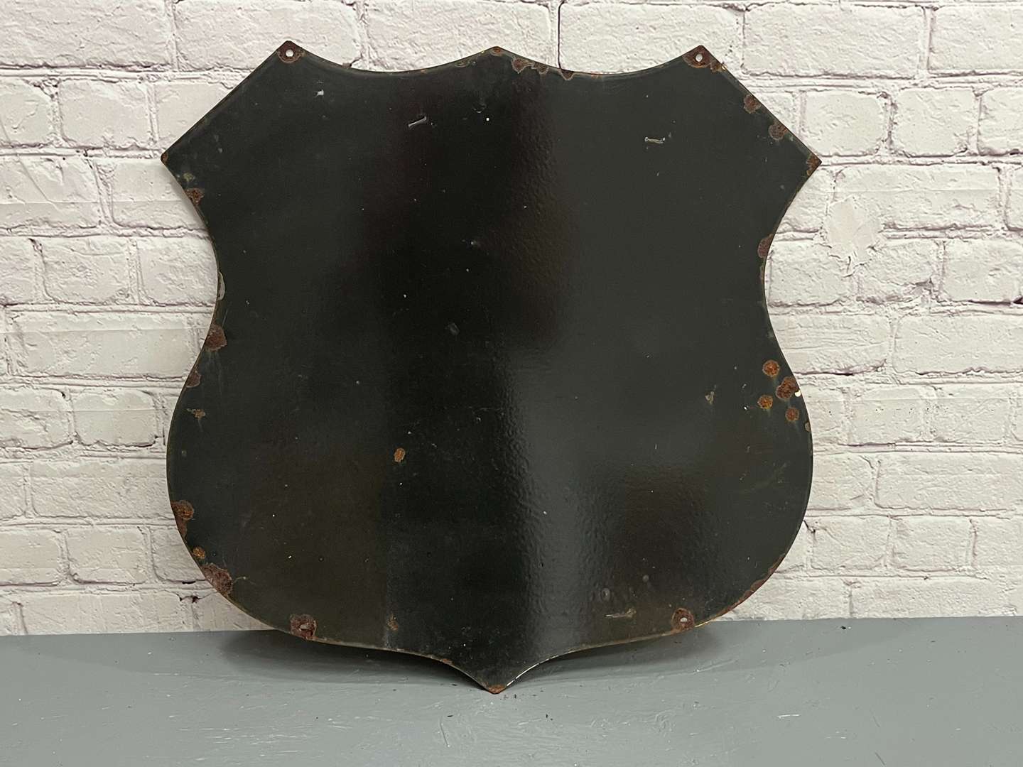 <p>Route 66 Plymouth Road Runner Enamel Shield Sign</p>