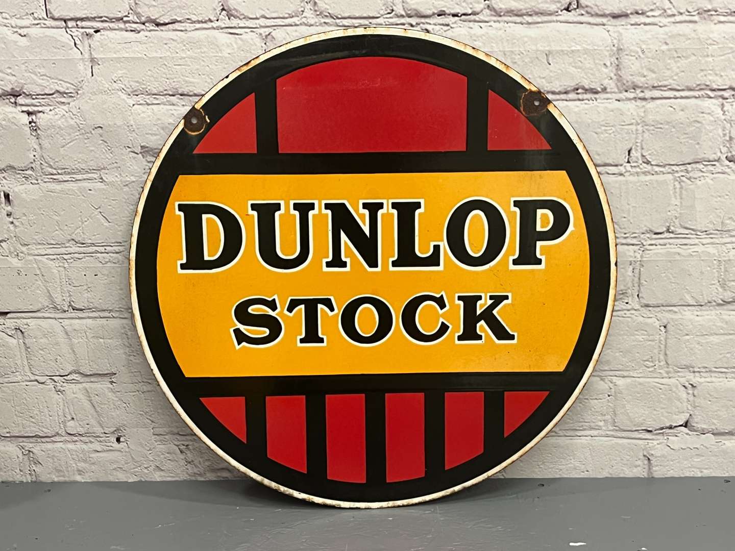 <p>Dunlop Stock Double Sided Enamel Sign</p>