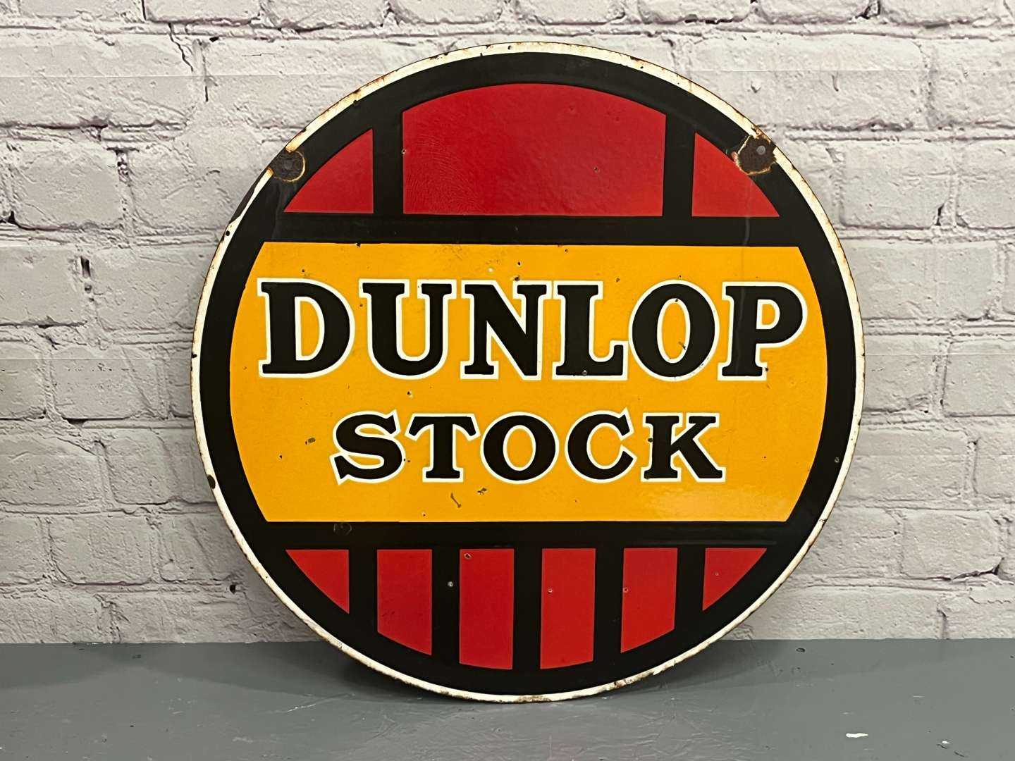 <p>Dunlop Stock Double Sided Enamel Sign</p>
