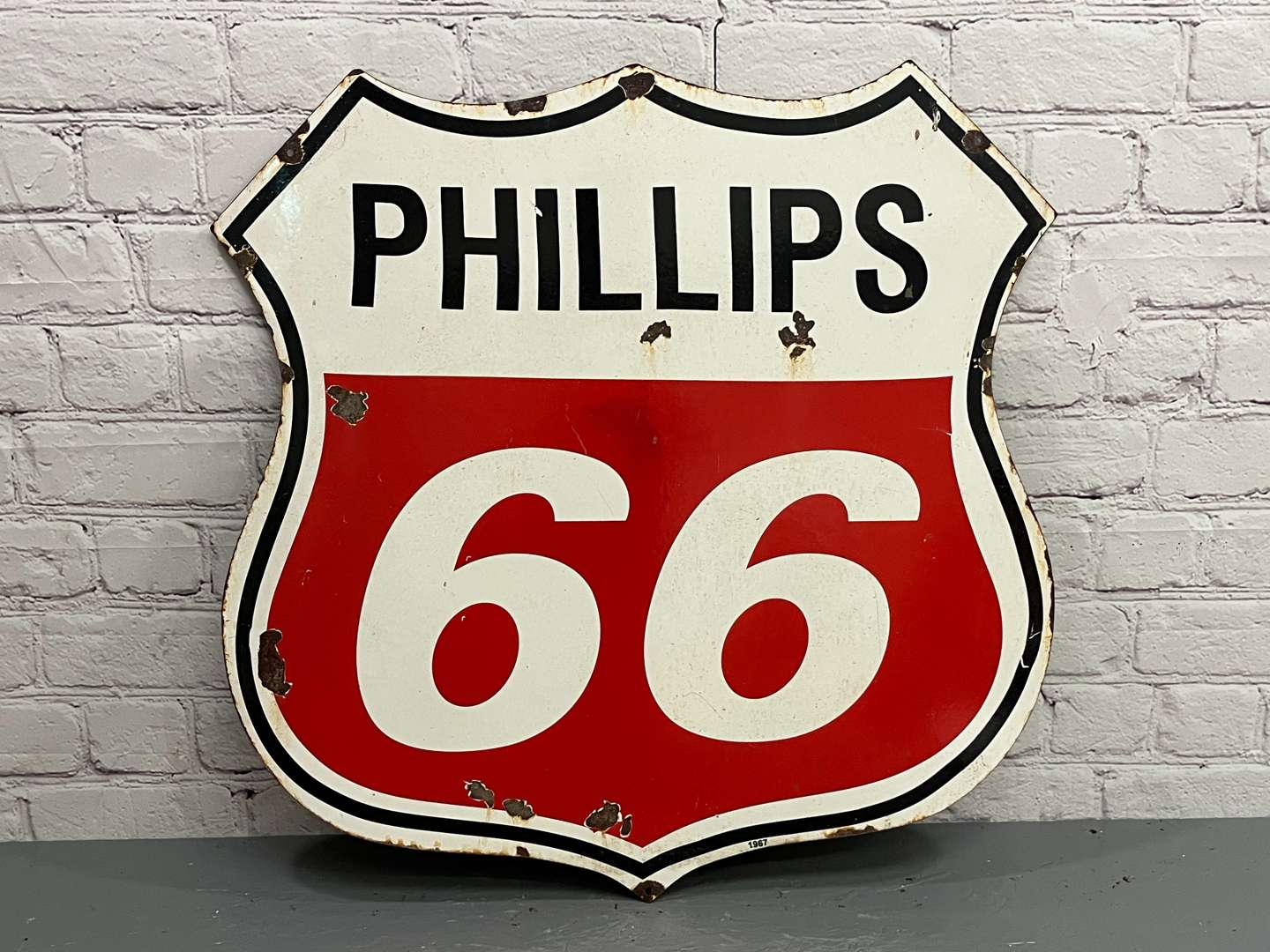 <p>Phillips 66 Enamel Shield Sign</p>