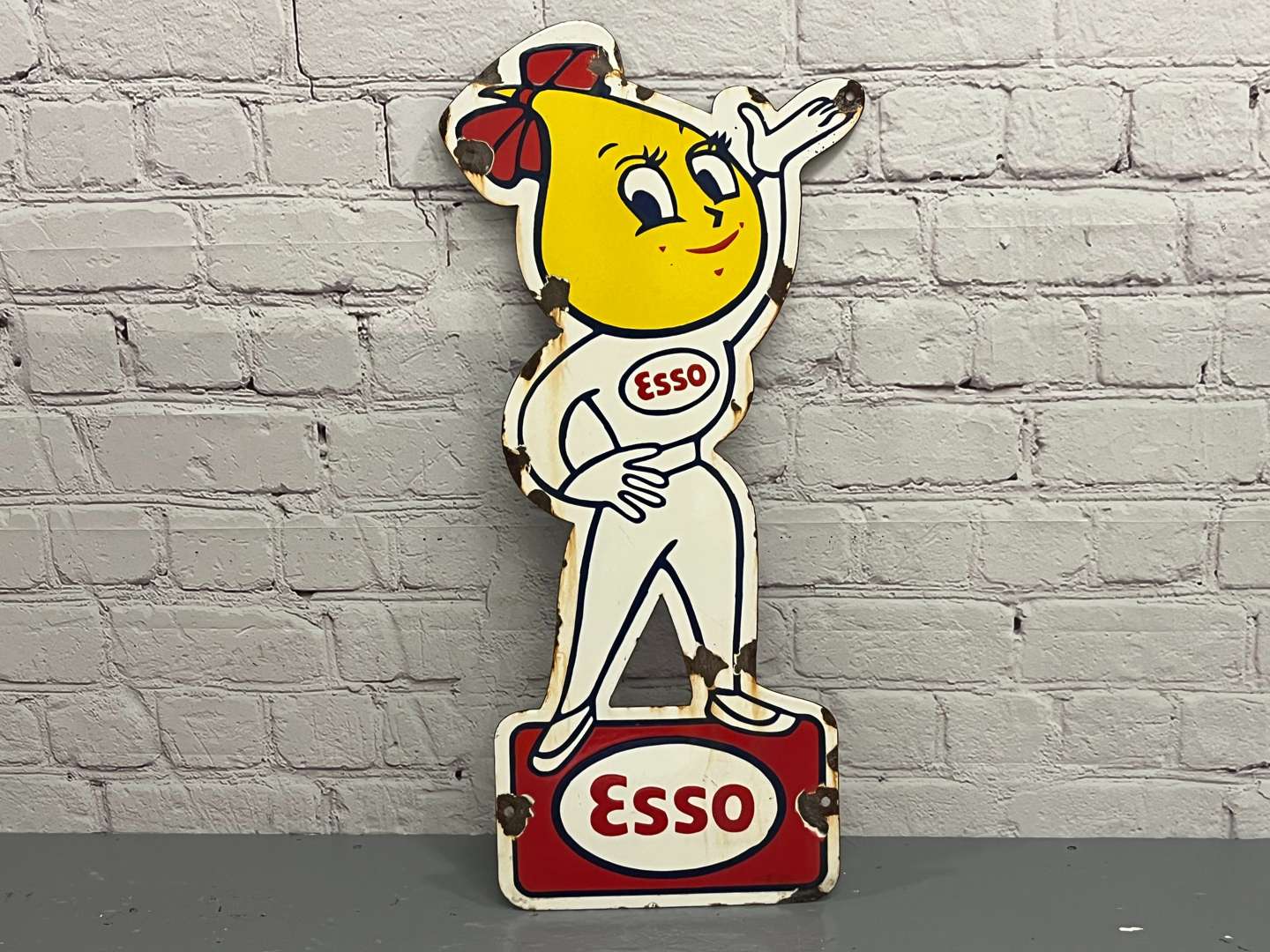 <p>Esso Mrs Drip Enamel Sign</p>
