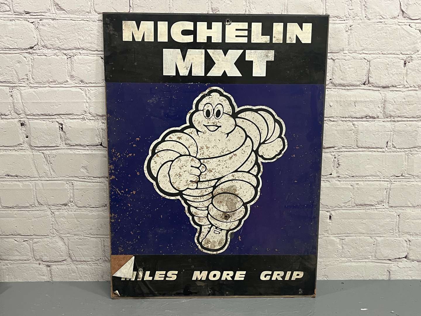 <p>Michelin MXT Miles More Grip Sign On Board&nbsp;</p>