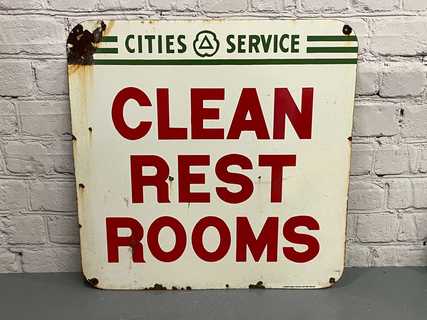 <p>Clean Restrooms Enamel Sign</p>