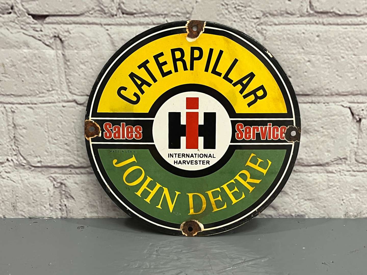 <p>Caterpillar and John Deere Circular Enamel Sign &nbsp;&nbsp;</p>