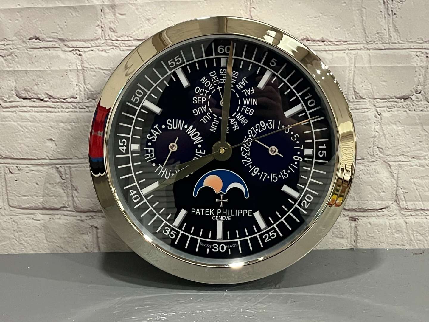 <p>Patek Philippe Modern Metal Wall Clock&nbsp;</p>