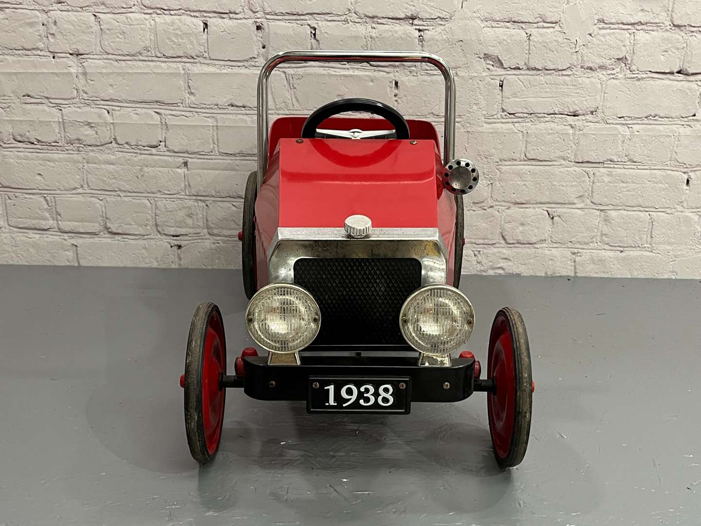 <p>Modern Tin Plate Childs Pedal Car</p>