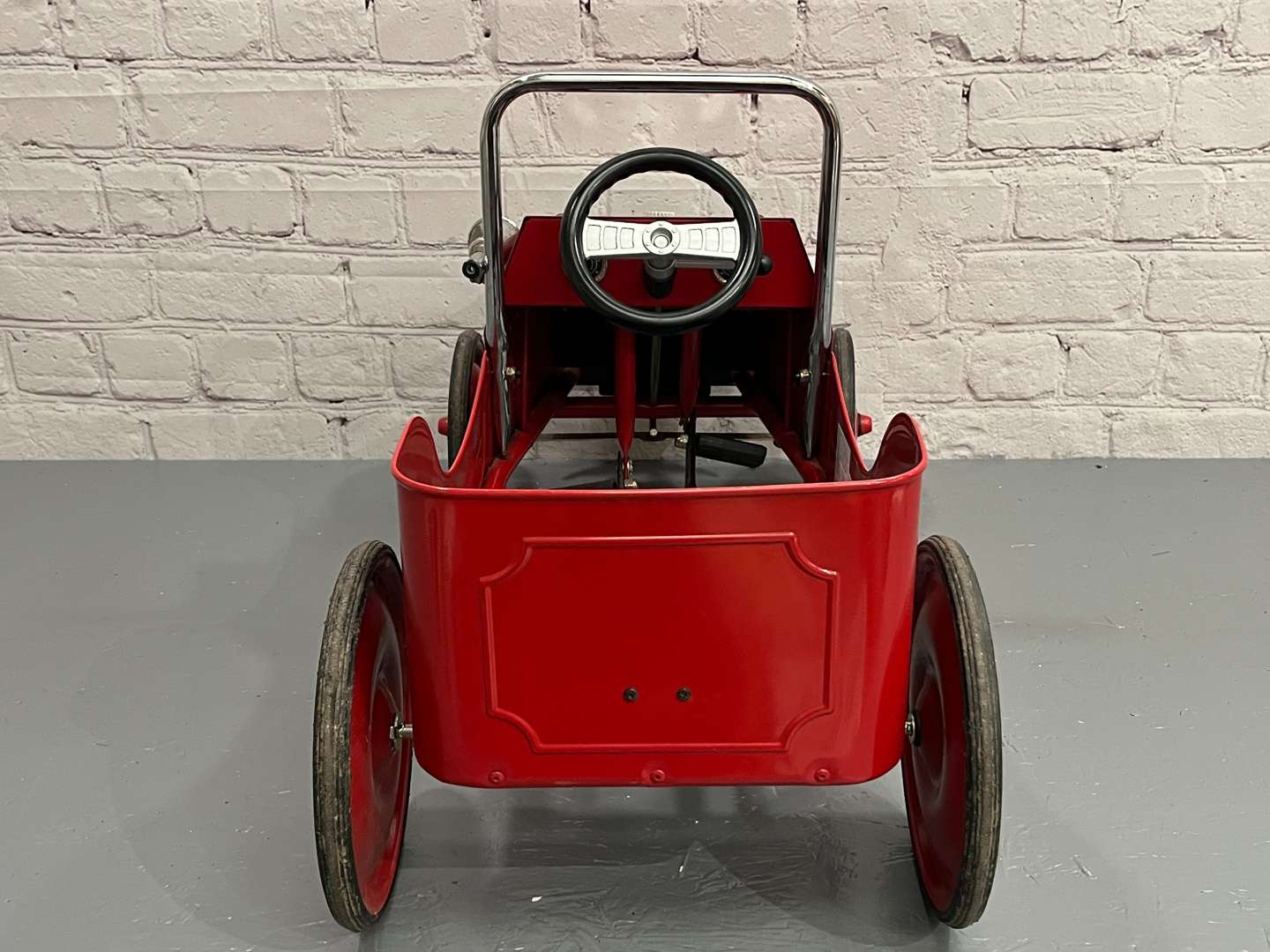 <p>Modern Tin Plate Childs Pedal Car</p>
