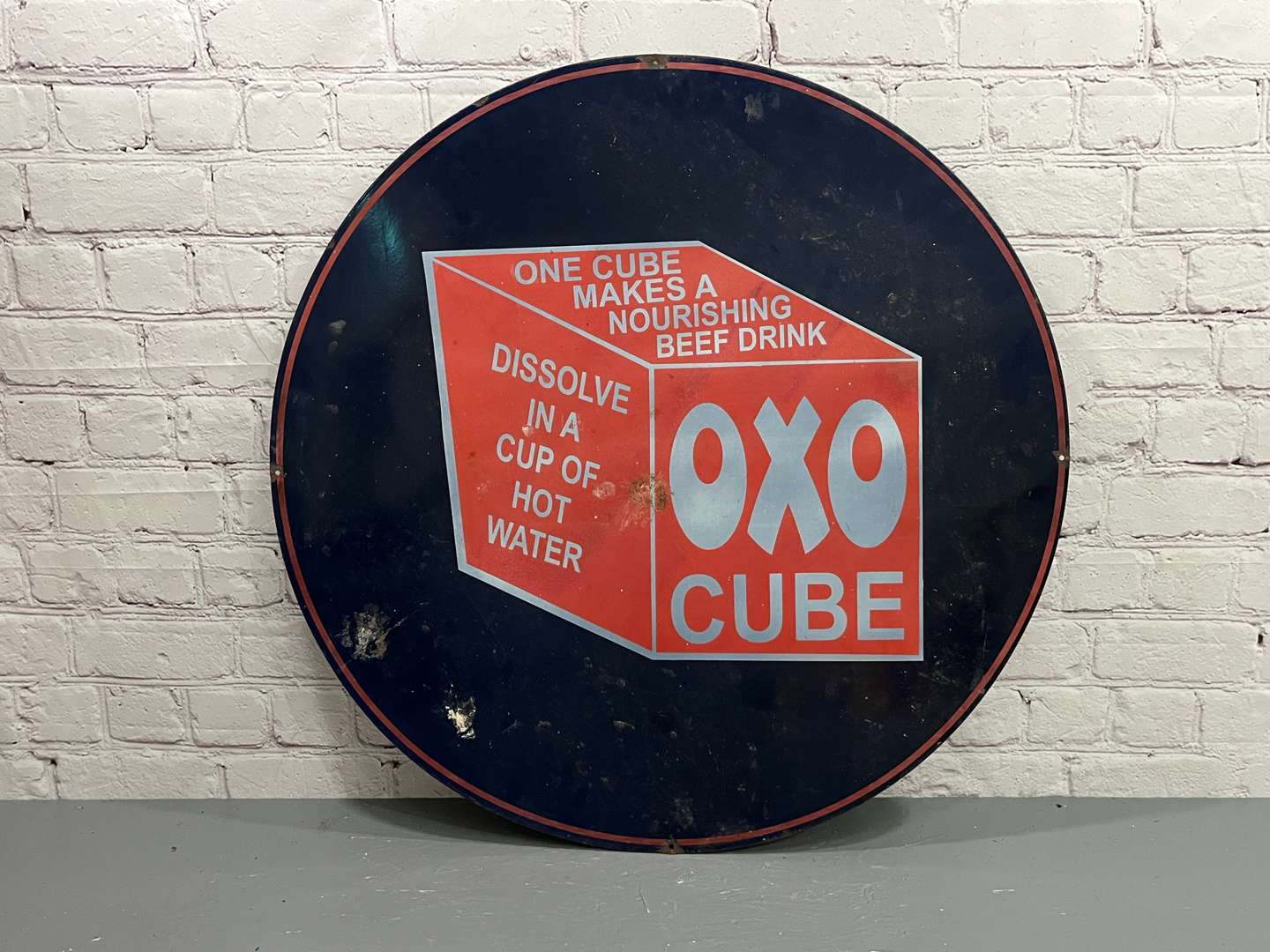 <p>OXO Cube Large Circular Metal Sign</p>