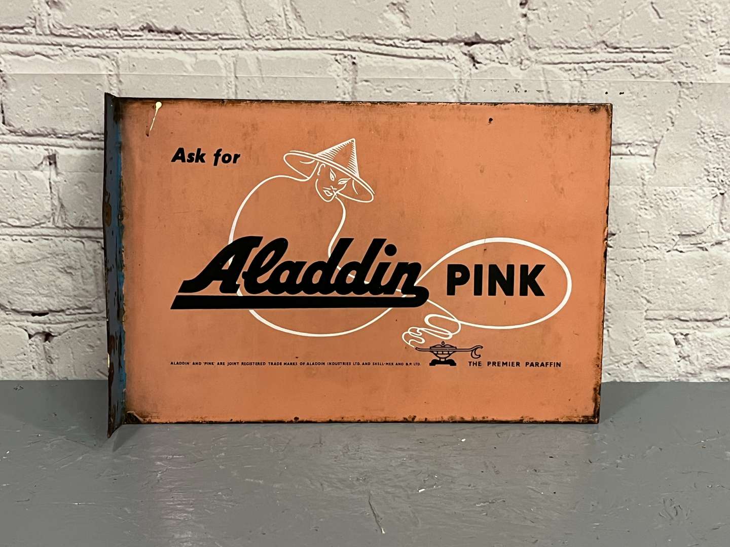 <p>Aladdin Pink Paraffin Enamel Flange Sign</p>