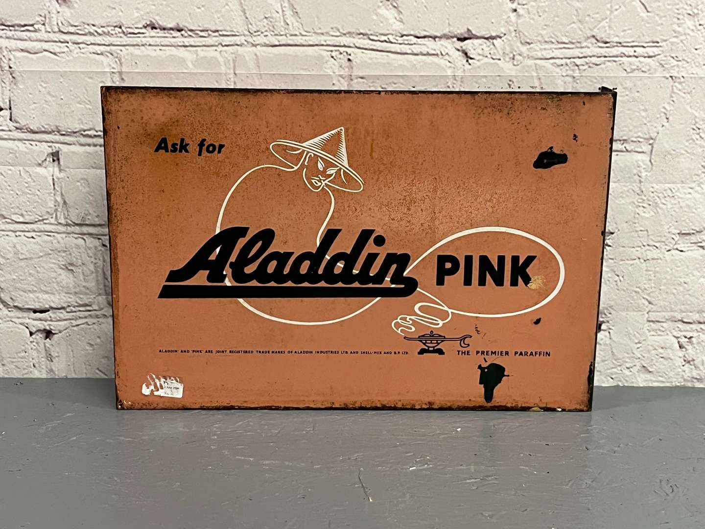 <p>Aladdin Pink Paraffin Enamel Flange Sign</p>