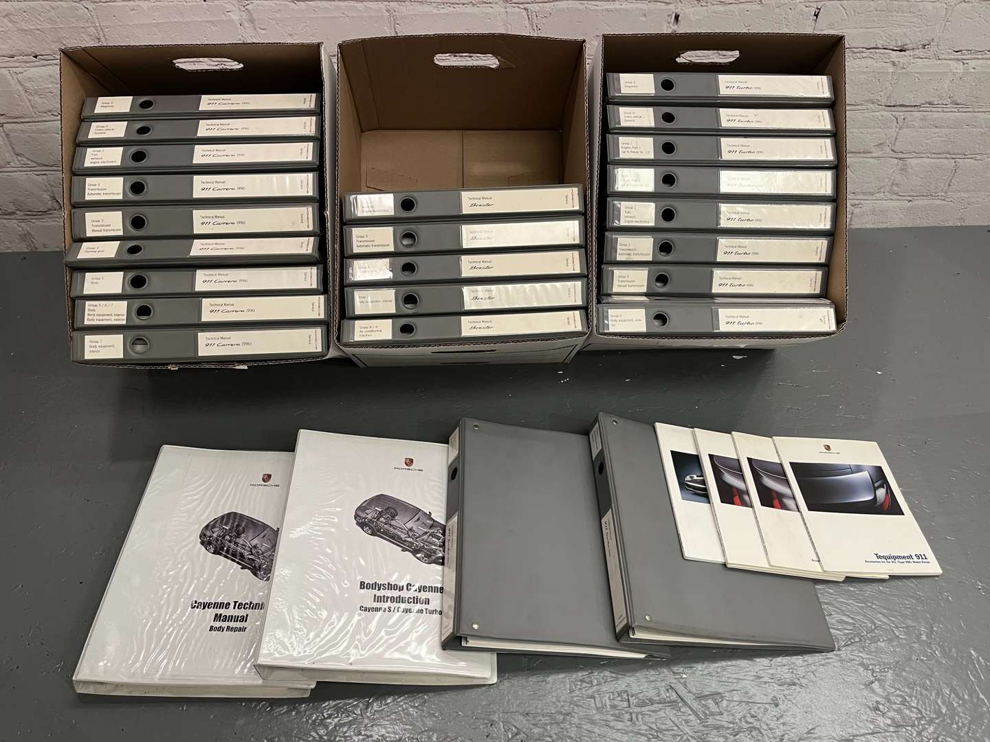 <p>Four Boxes Of Porsche Manuals&nbsp;</p>