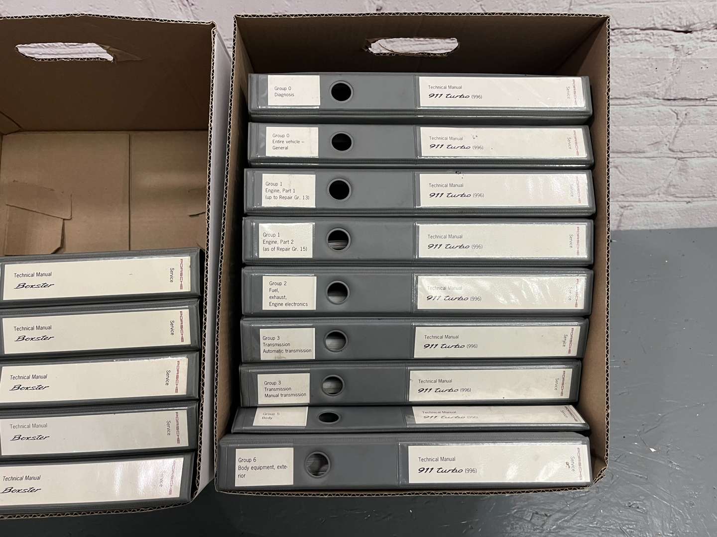 <p>Four Boxes Of Porsche Manuals&nbsp;</p>