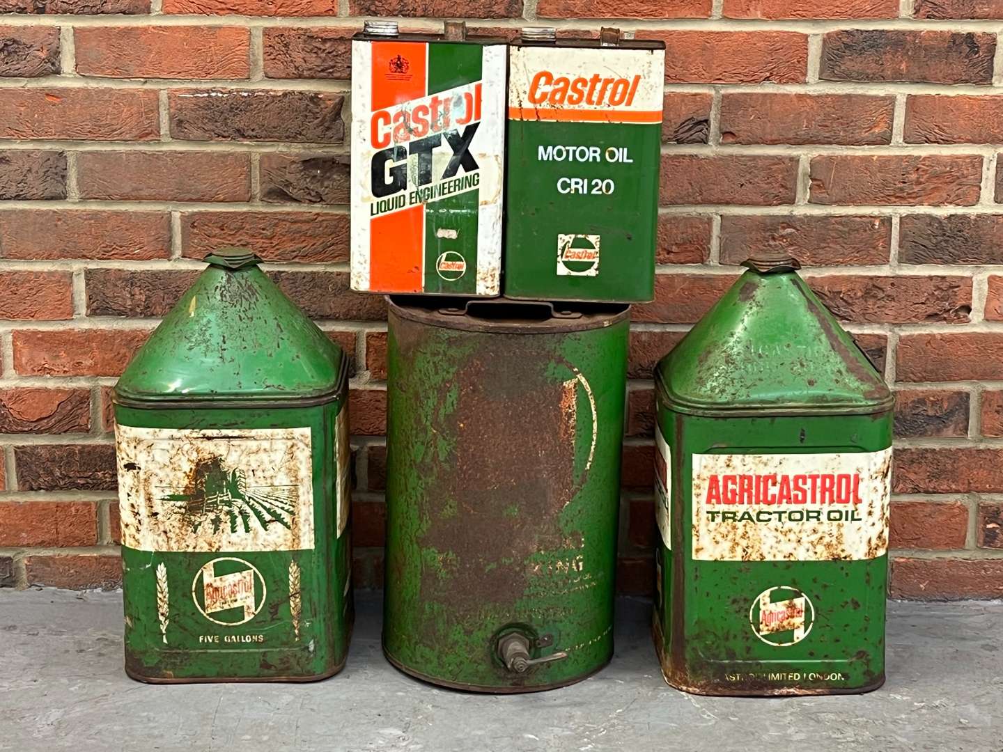 <p>Five Castrol Oil Cans/Drums&nbsp;</p>