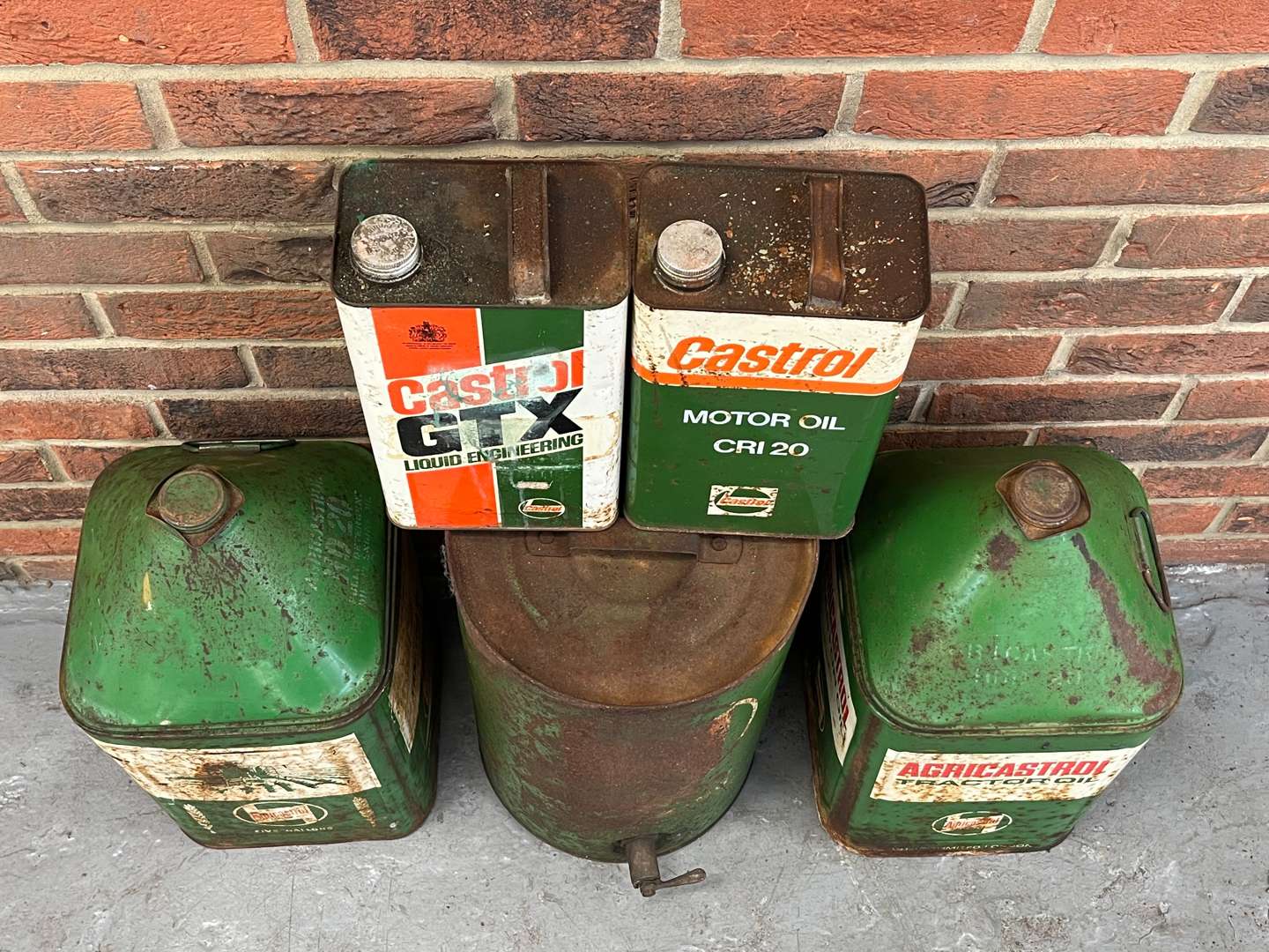 <p>Five Castrol Oil Cans/Drums&nbsp;</p>