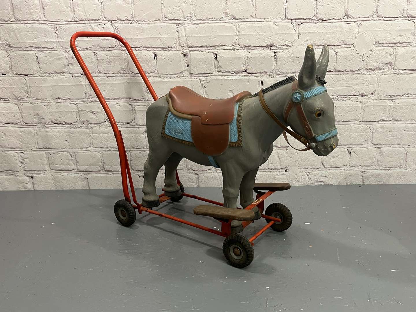 <p>Tri-ang Childs Ride on Donkey</p>