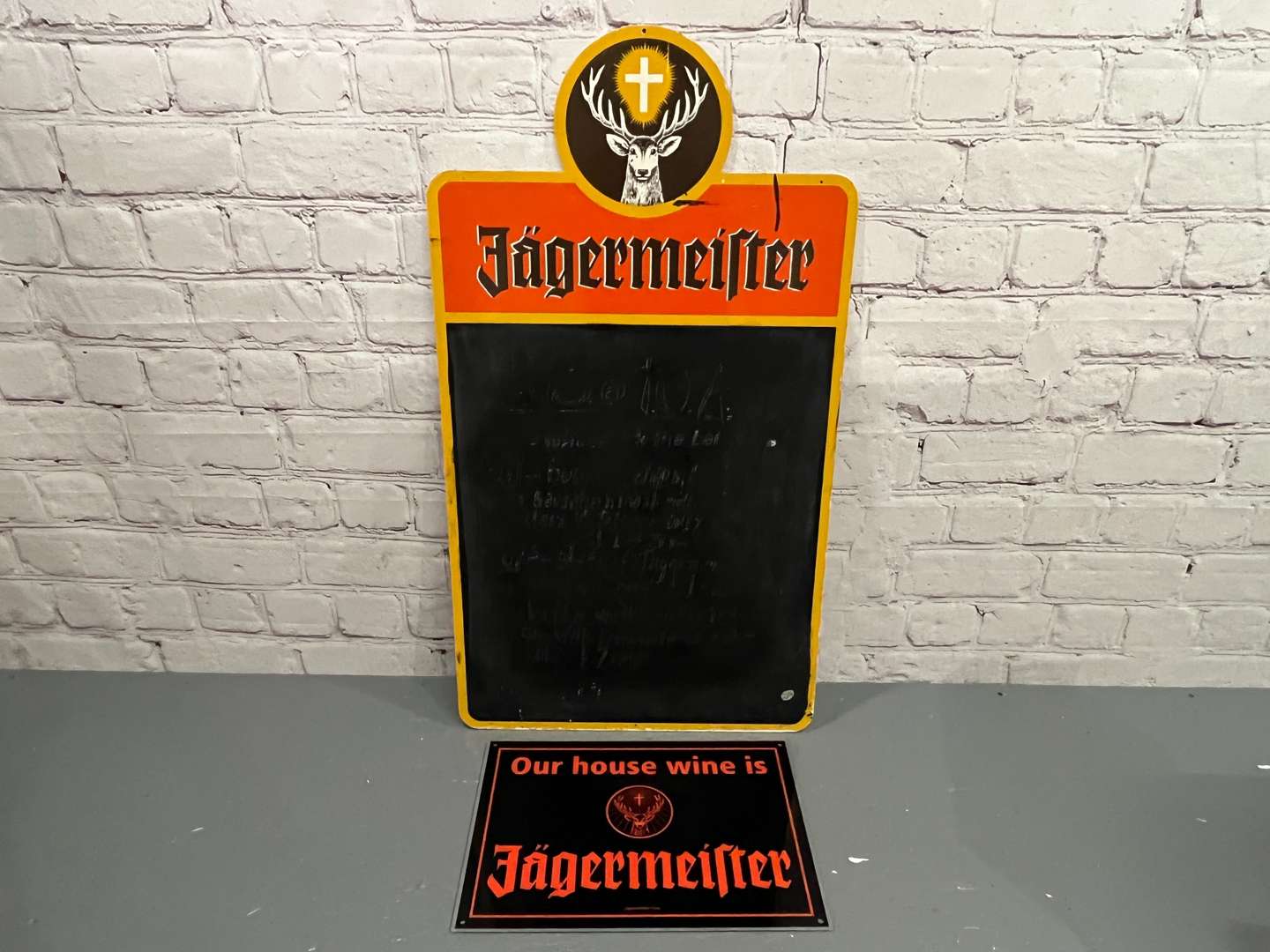 <p>Two Jagermeister Signs</p>