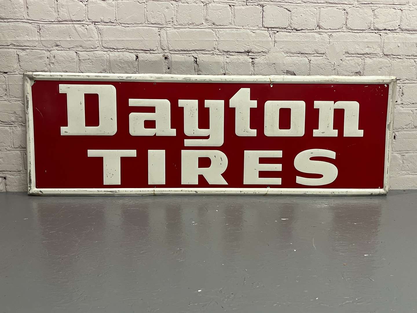 <p>Dayton Tires Pressed Metal Sign</p>