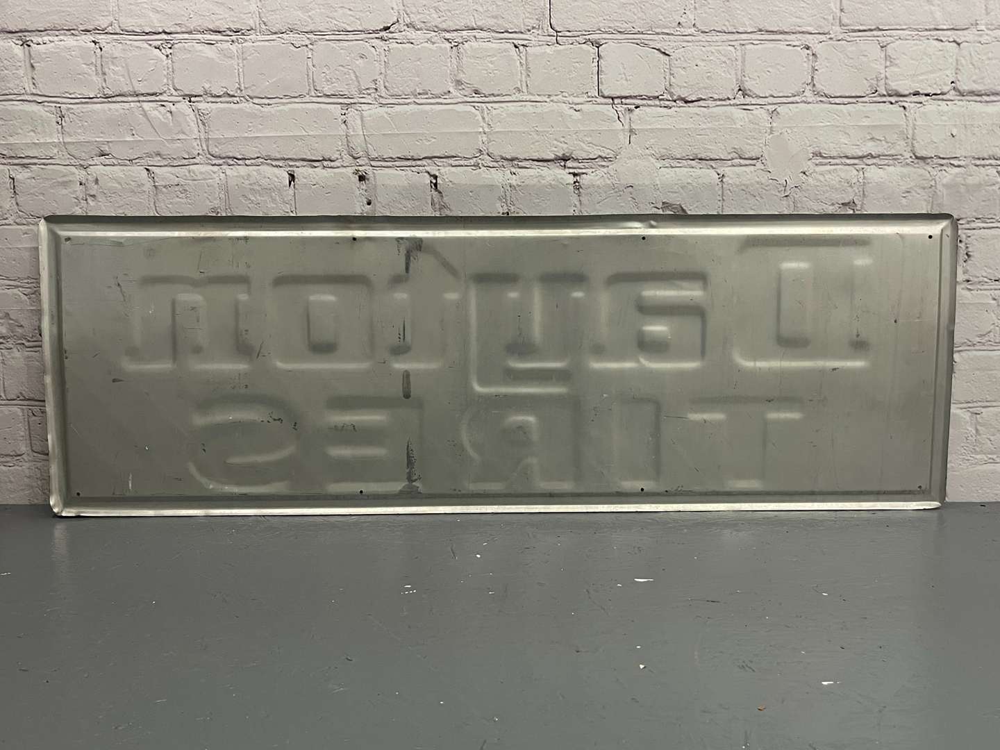 <p>Dayton Tires Pressed Metal Sign</p>
