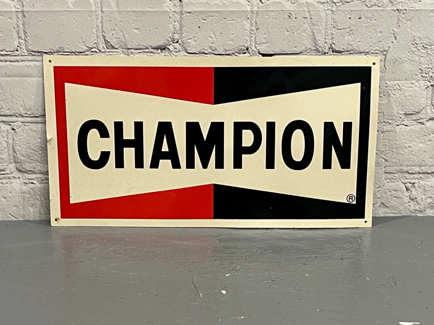 <p>Champion Spark Plug Plastic Sign</p>