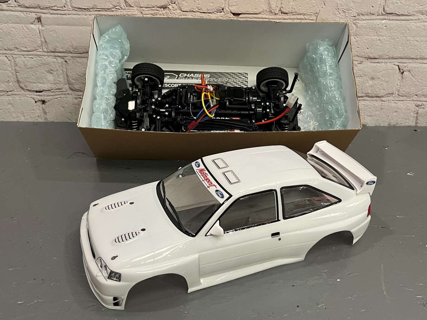 <p>Ford Escort Cosworth RC Car By Tamiya 1:10 Scale&nbsp;</p>