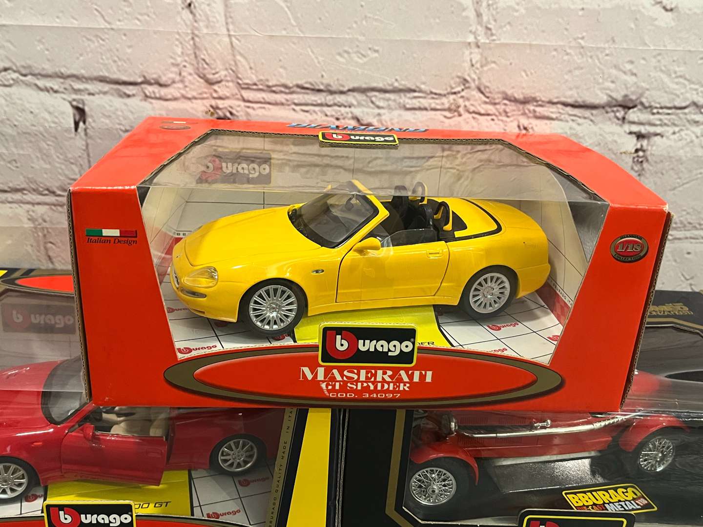 <p>Seven 1:18 Scale Boxed Burago Model Cars</p>