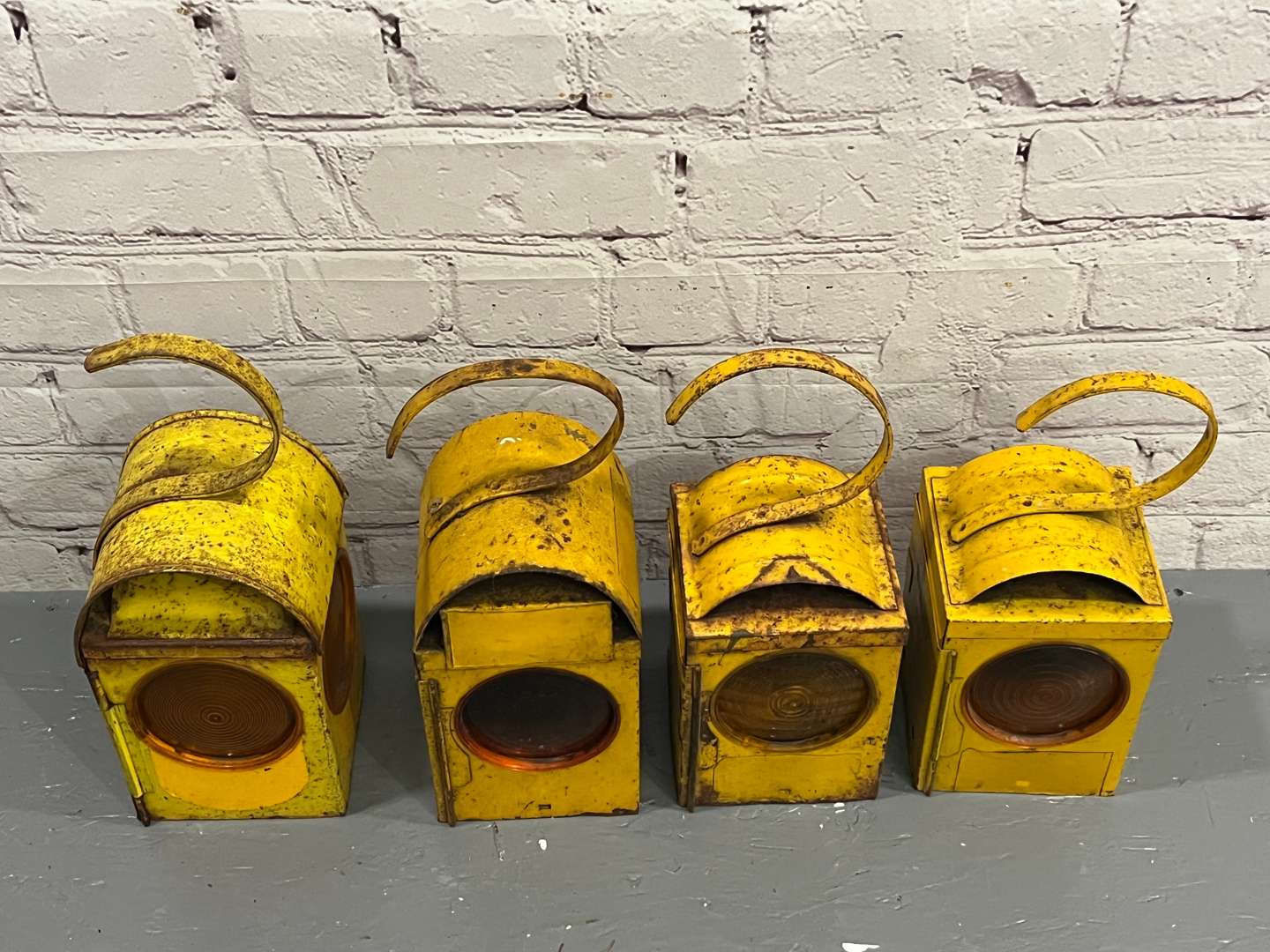 <p>Four Metal Road side Warning Lamps</p>