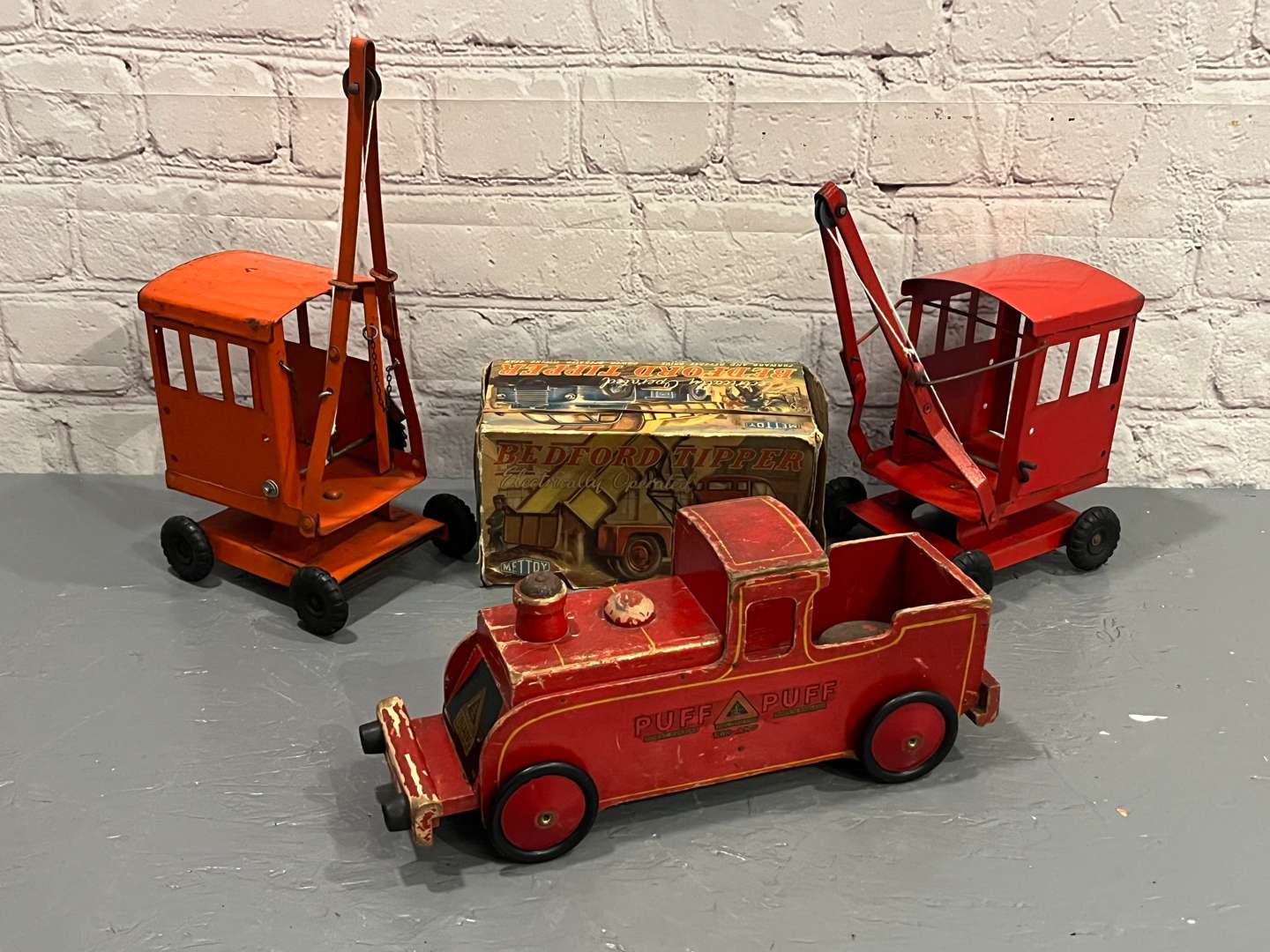 <p>Two Tri-ang Cranes, Boxed Mettoy Bedford Tipper Truck Etc</p>