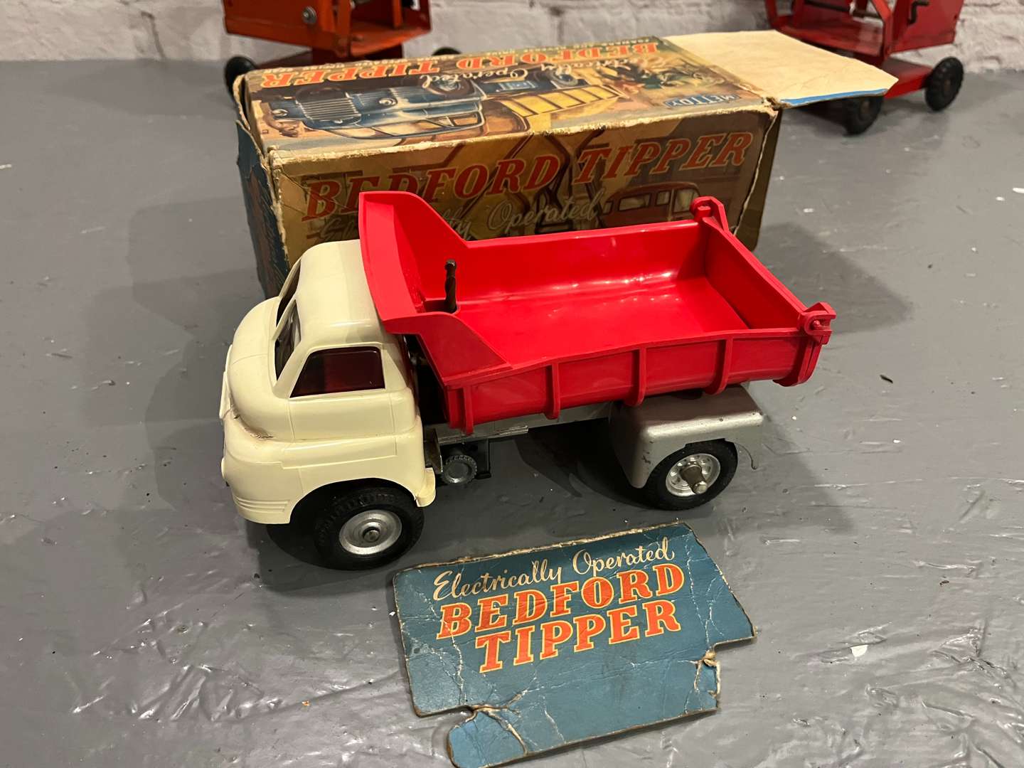 <p>Two Tri-ang Cranes, Boxed Mettoy Bedford Tipper Truck Etc</p>