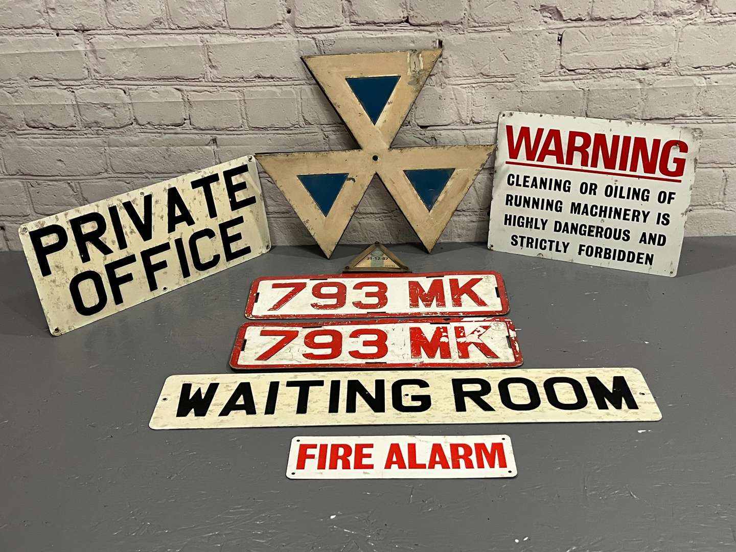 <p>Seven Metal Motoring Related Sign</p>