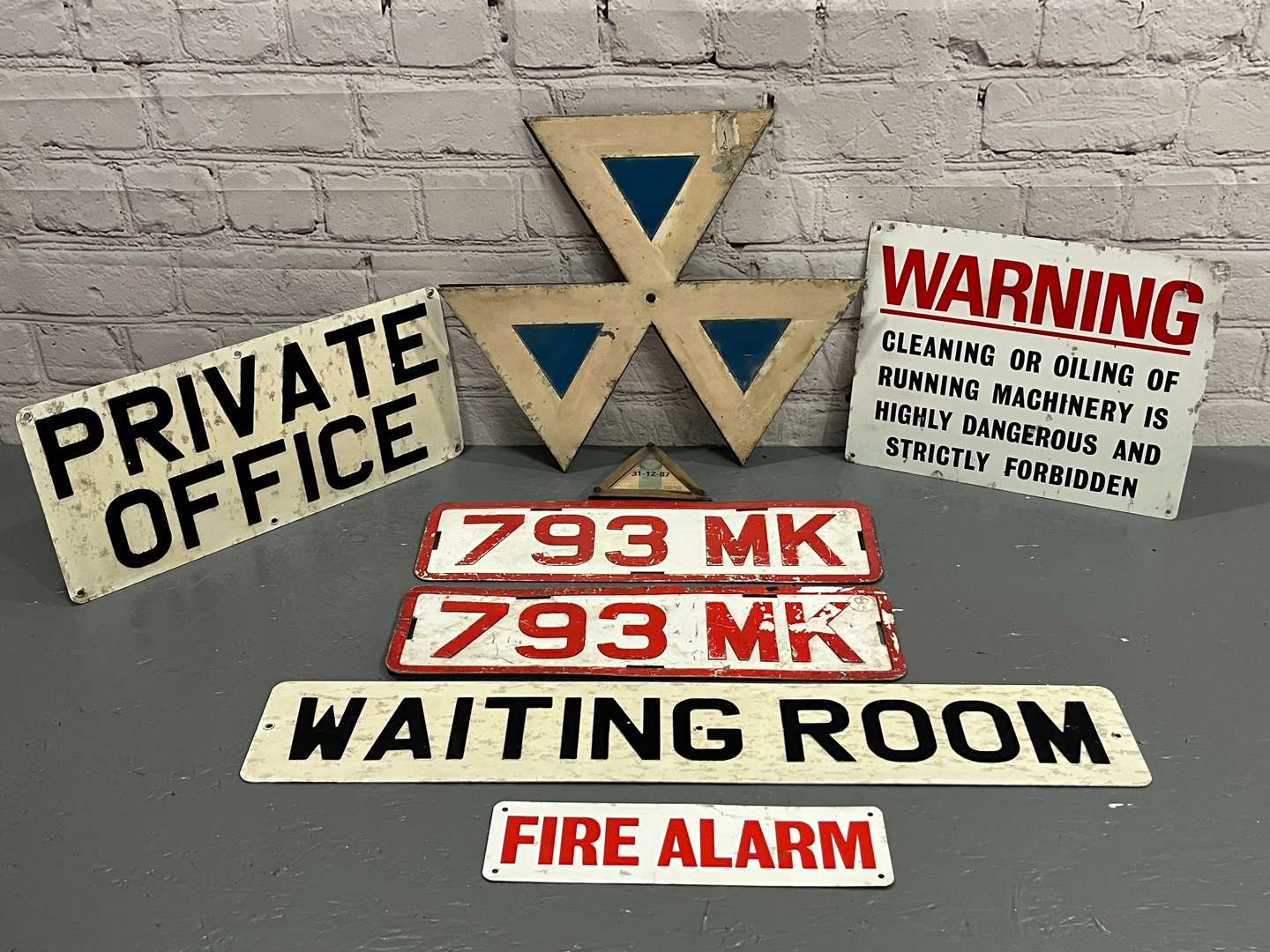 <p>Seven Metal Motoring Related Sign</p>