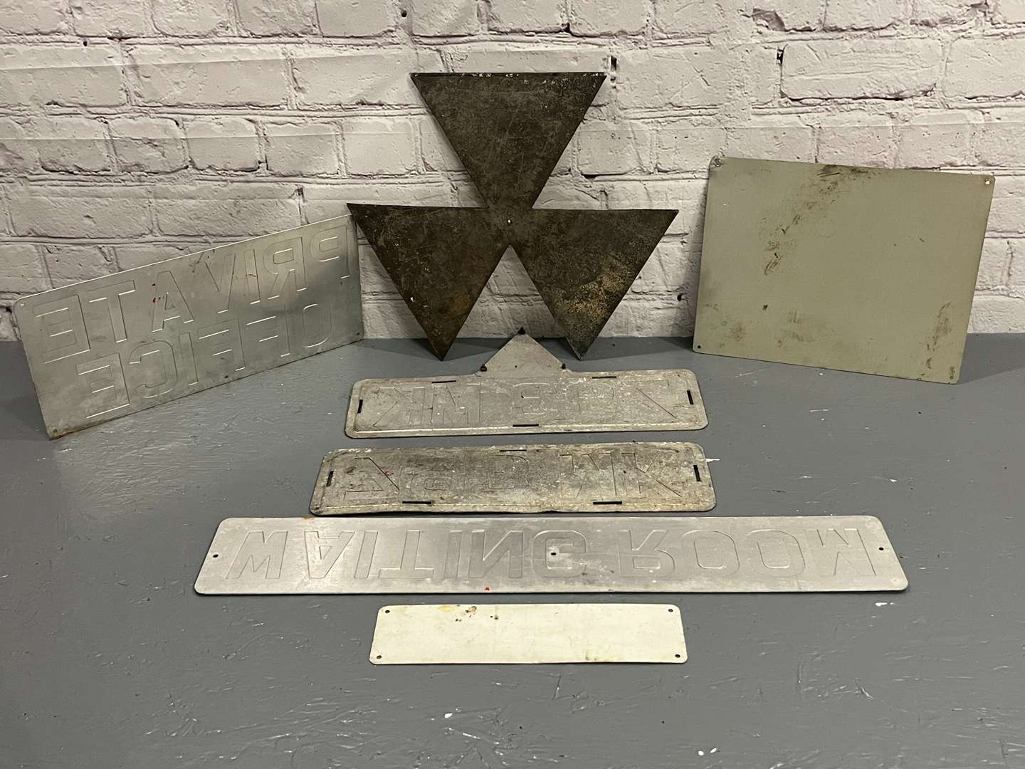 <p>Seven Metal Motoring Related Sign</p>